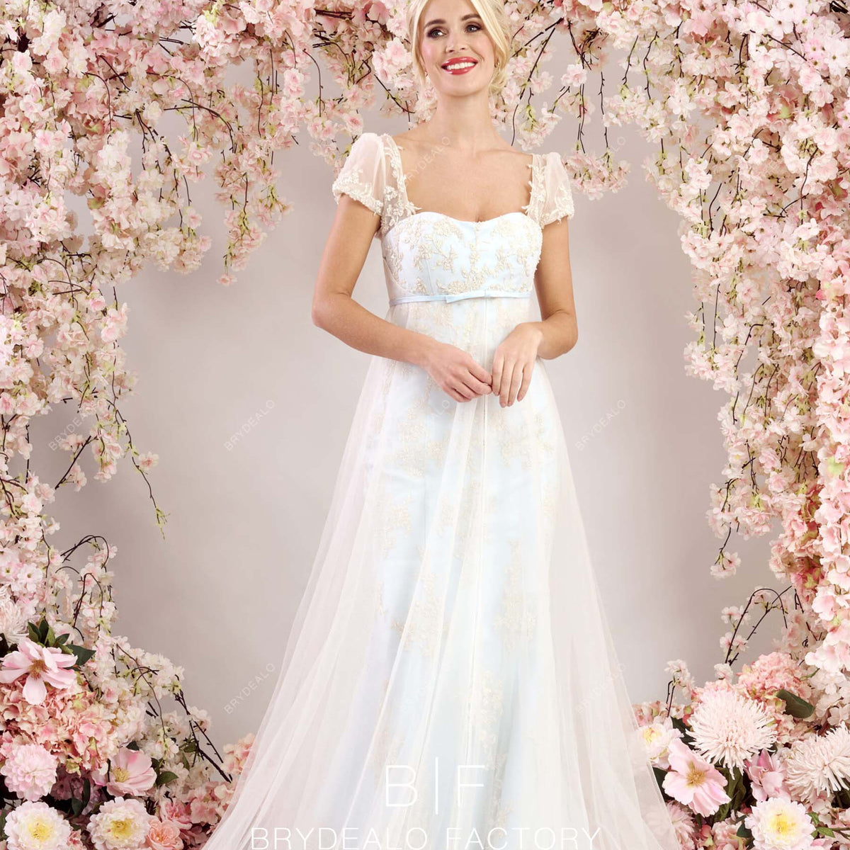 sachin and babi light blue dress This gown has a champagne skirt with a layer of shimmering powdered blue  tule that lays beautifully over the champagne creating just the perfect  twinkle in the light. ✨ style RQ1166 by main image 1