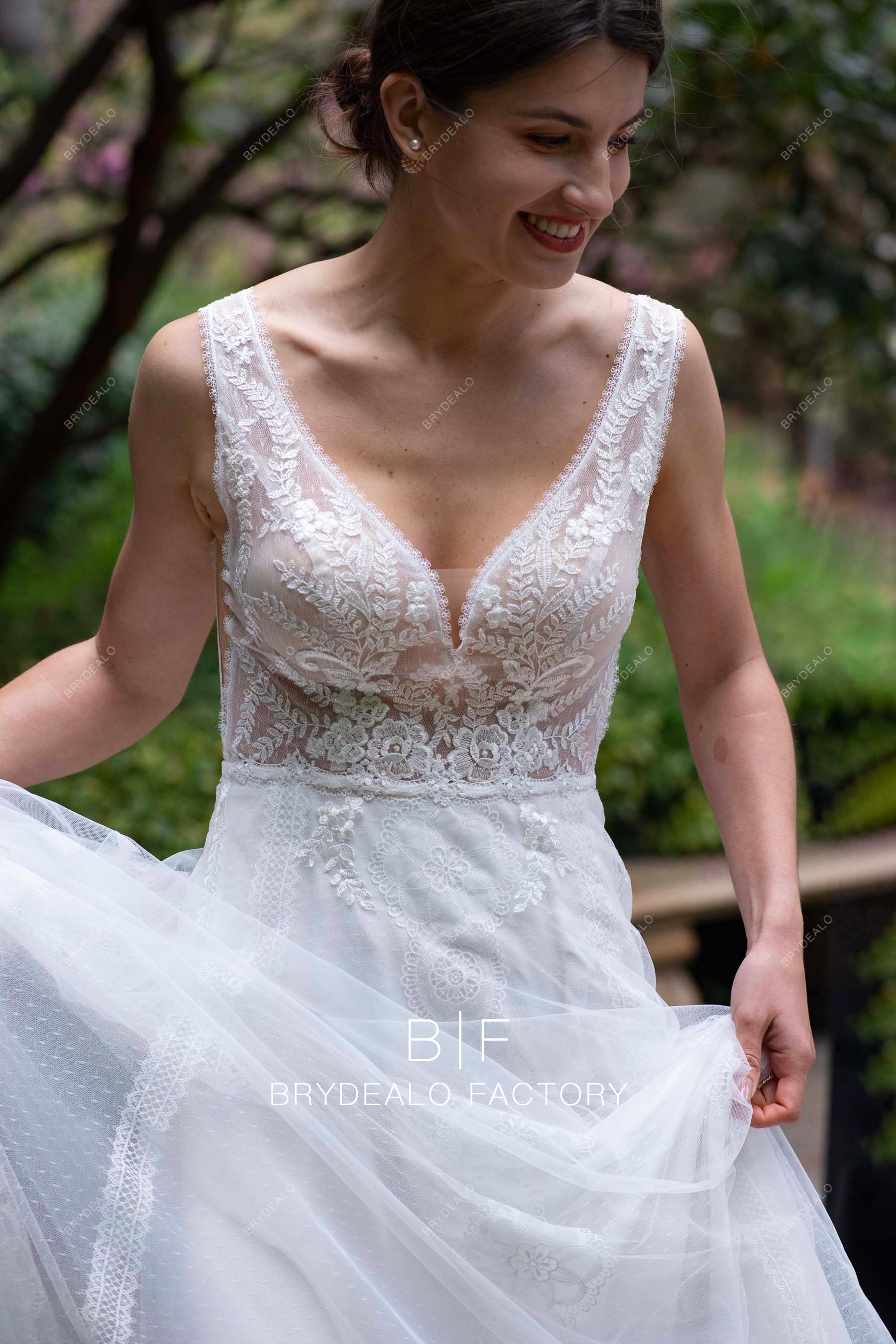 delicate lace plunging spring fall wedding dress