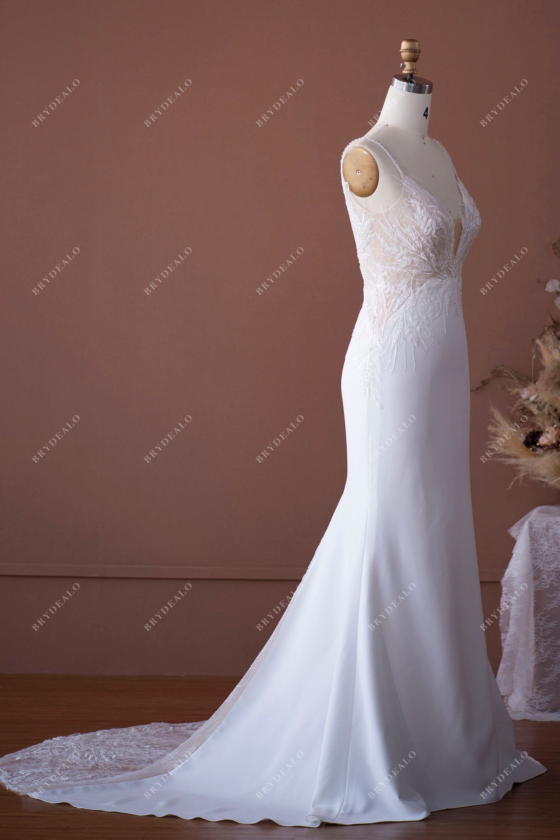 sleeveless lace crepe chapel train bridal gown