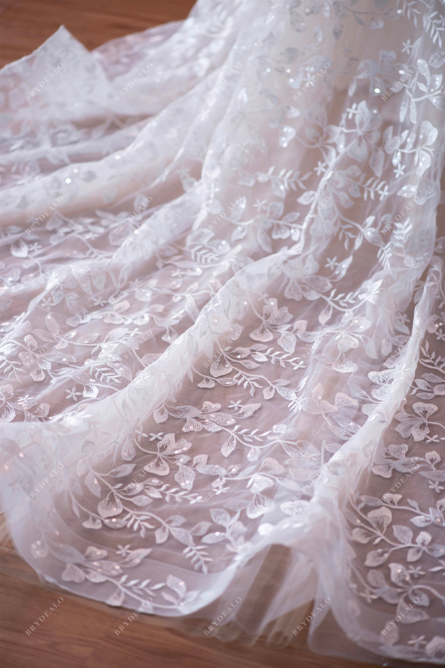 designer horsehair hem lace wedding gown