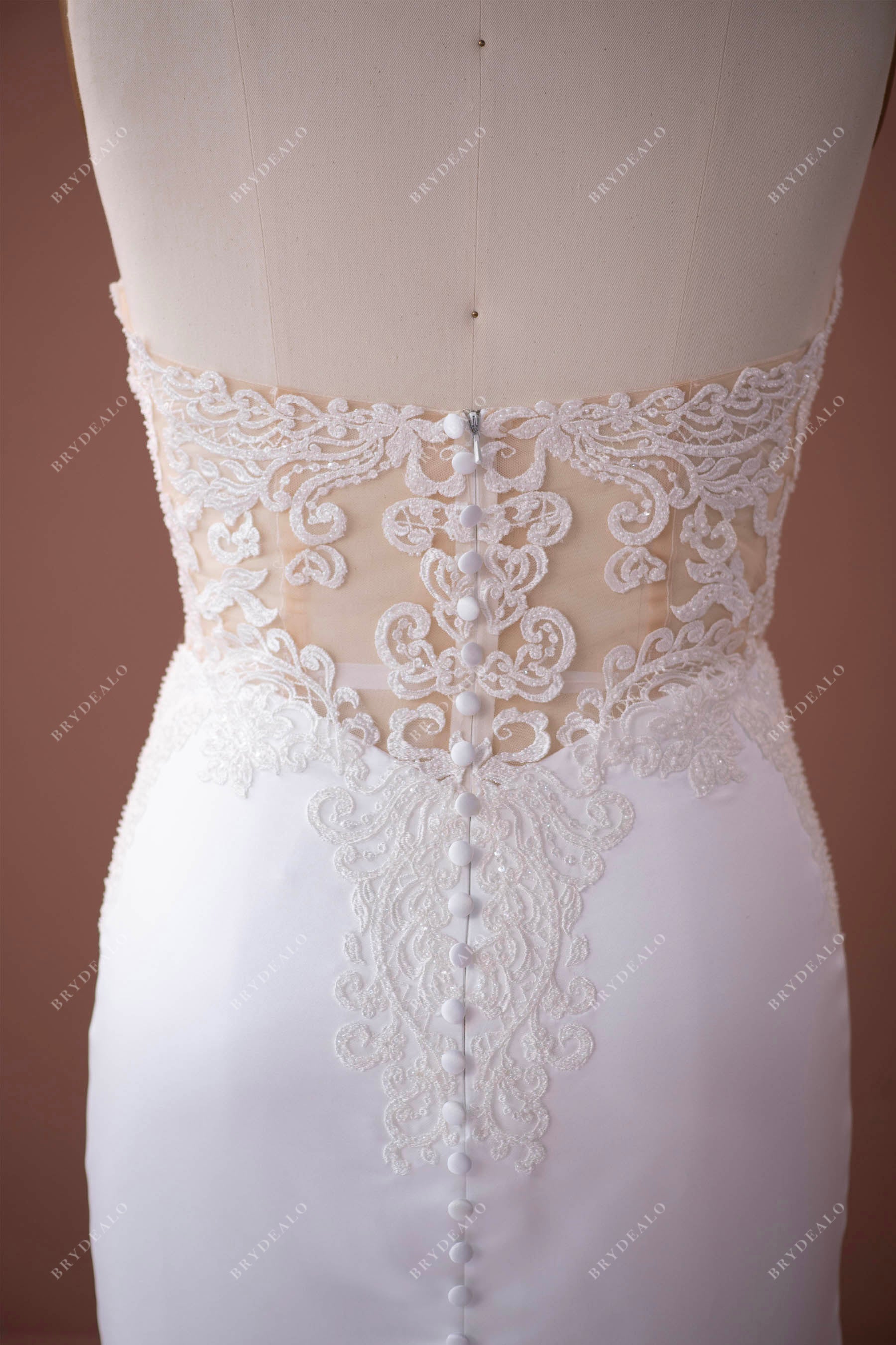 illusion lace buttoned back wedding gown