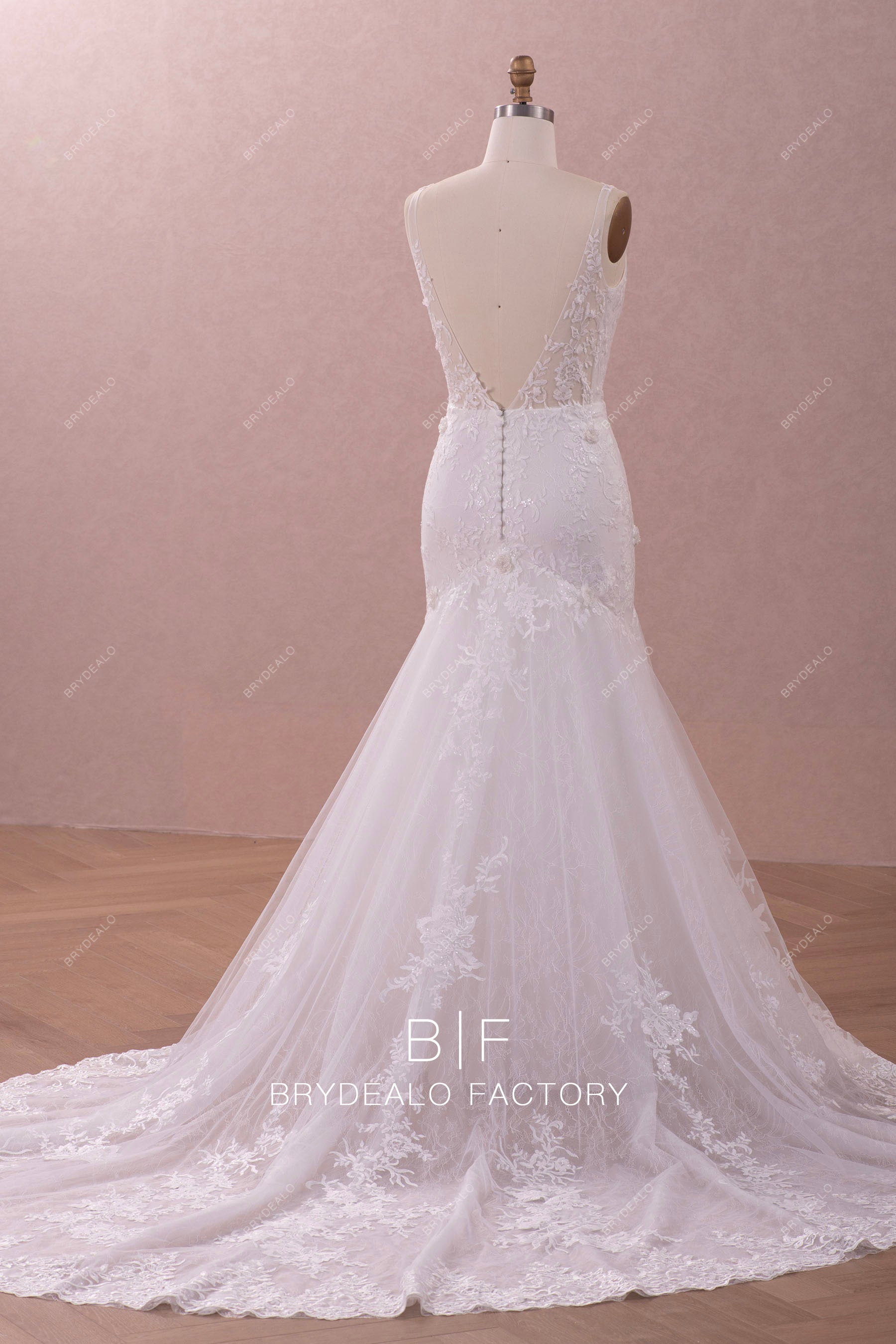 buttoned back trumpet bridal gown