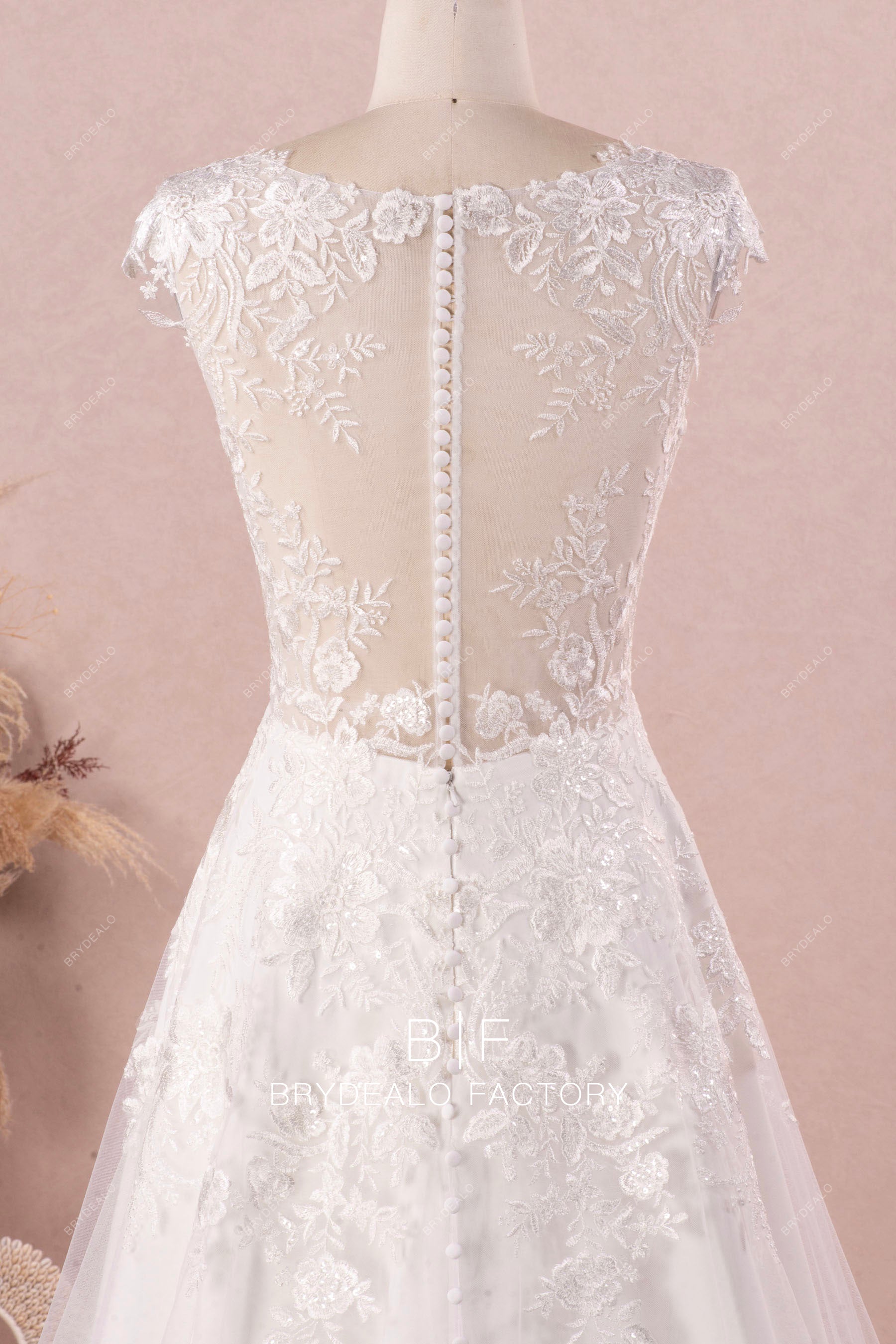 illusion cap sleeve buttoned lace back spring wedding dress