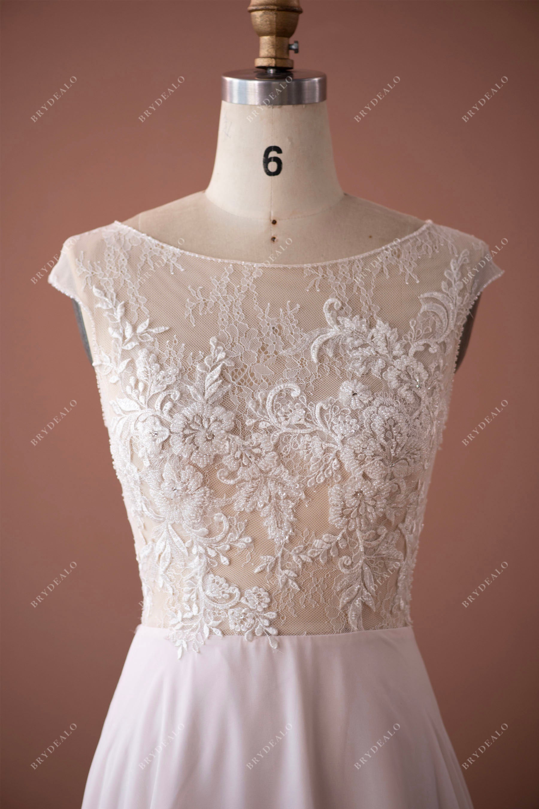 bateau neck illusion cap sleeve lace wedding dress