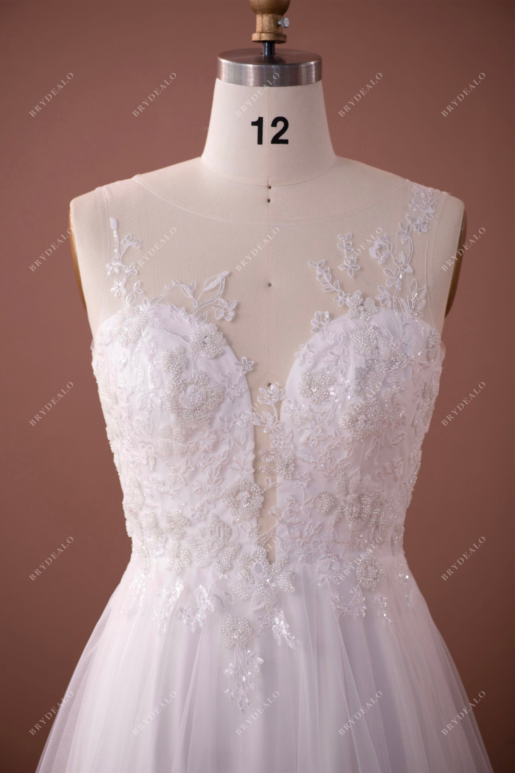 Plunging neck sleeveless gorgeous wedding dress