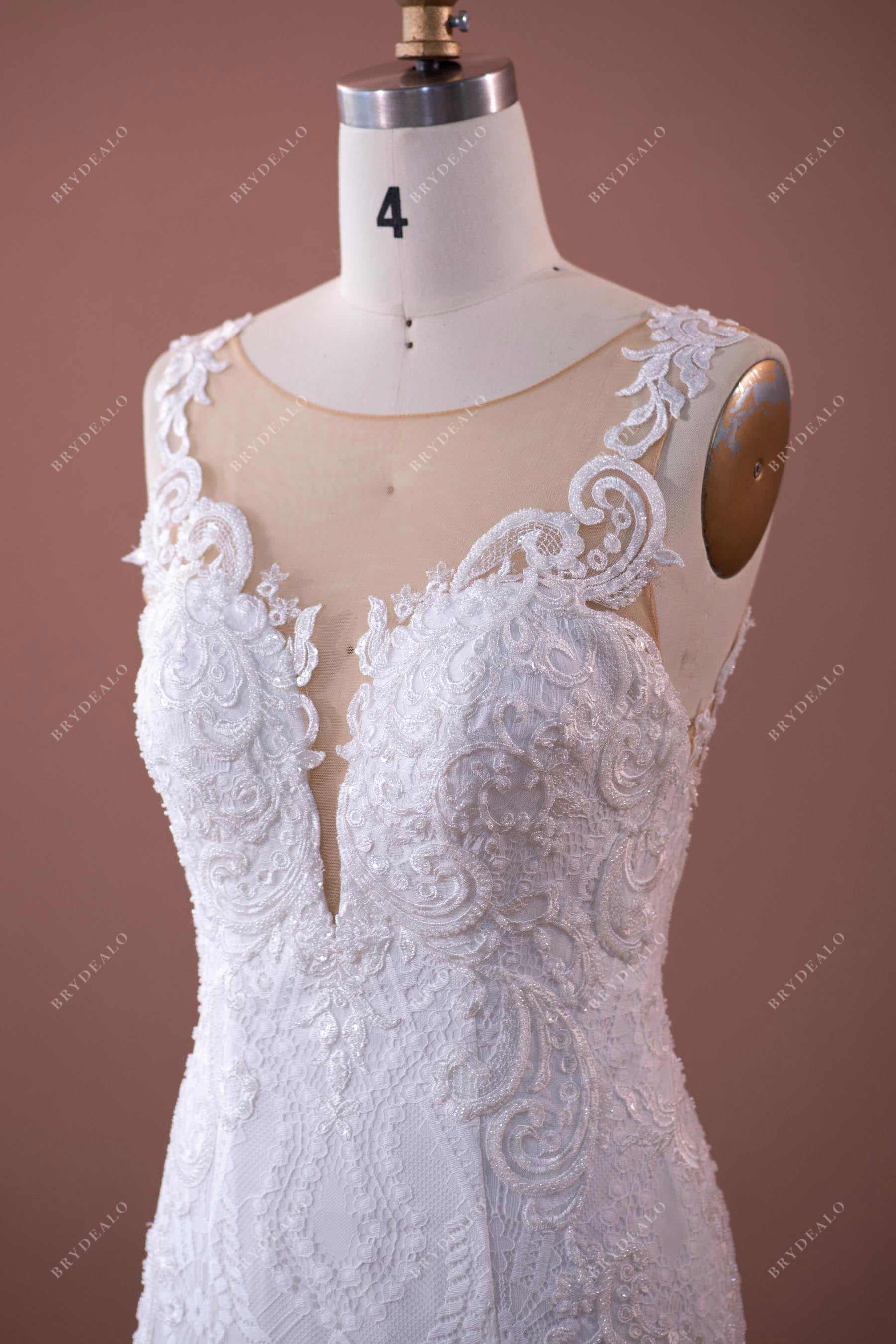sleeveless illusion neckline lace wedding gown