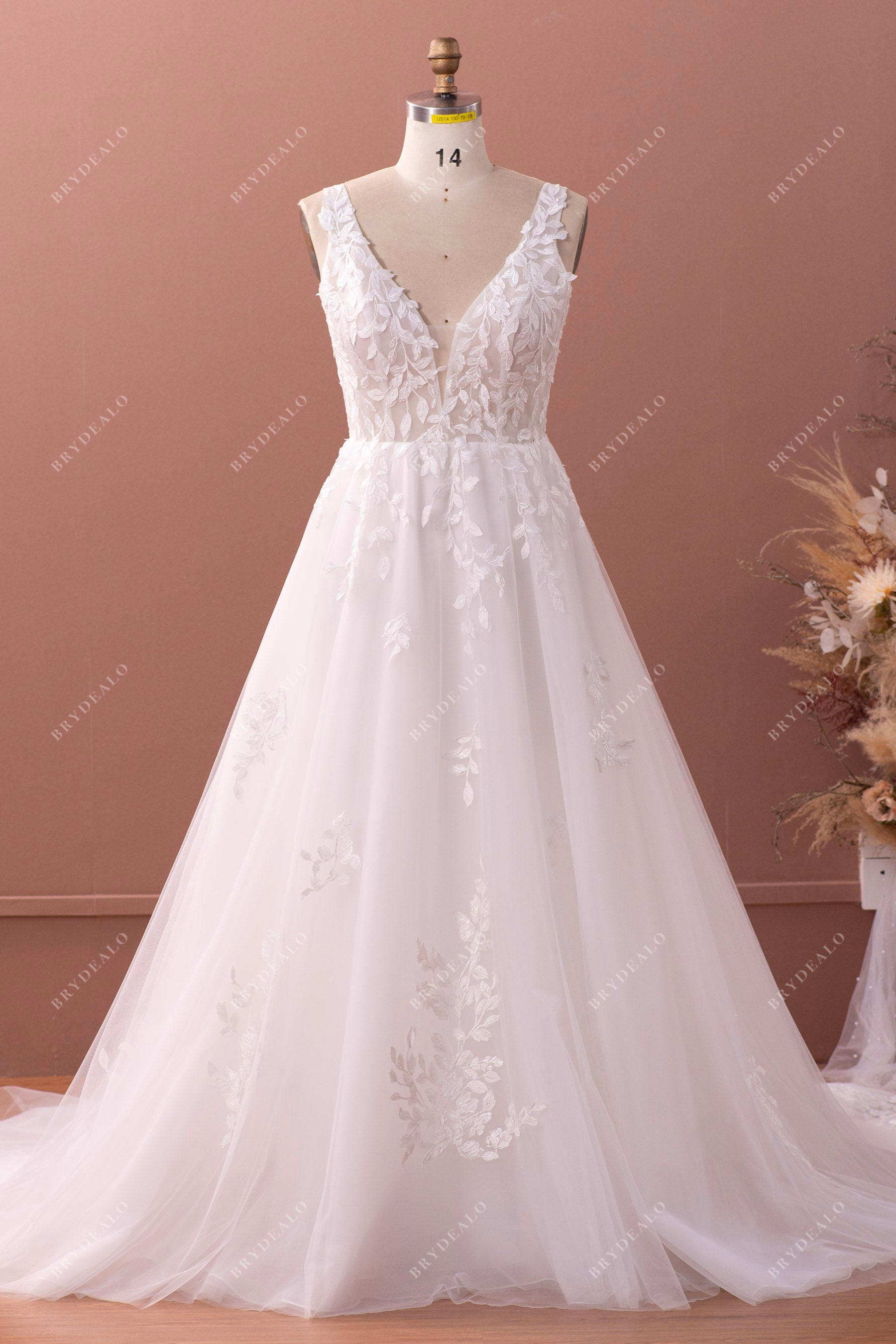elegant illusion plunging neck A-line lace wedding gown