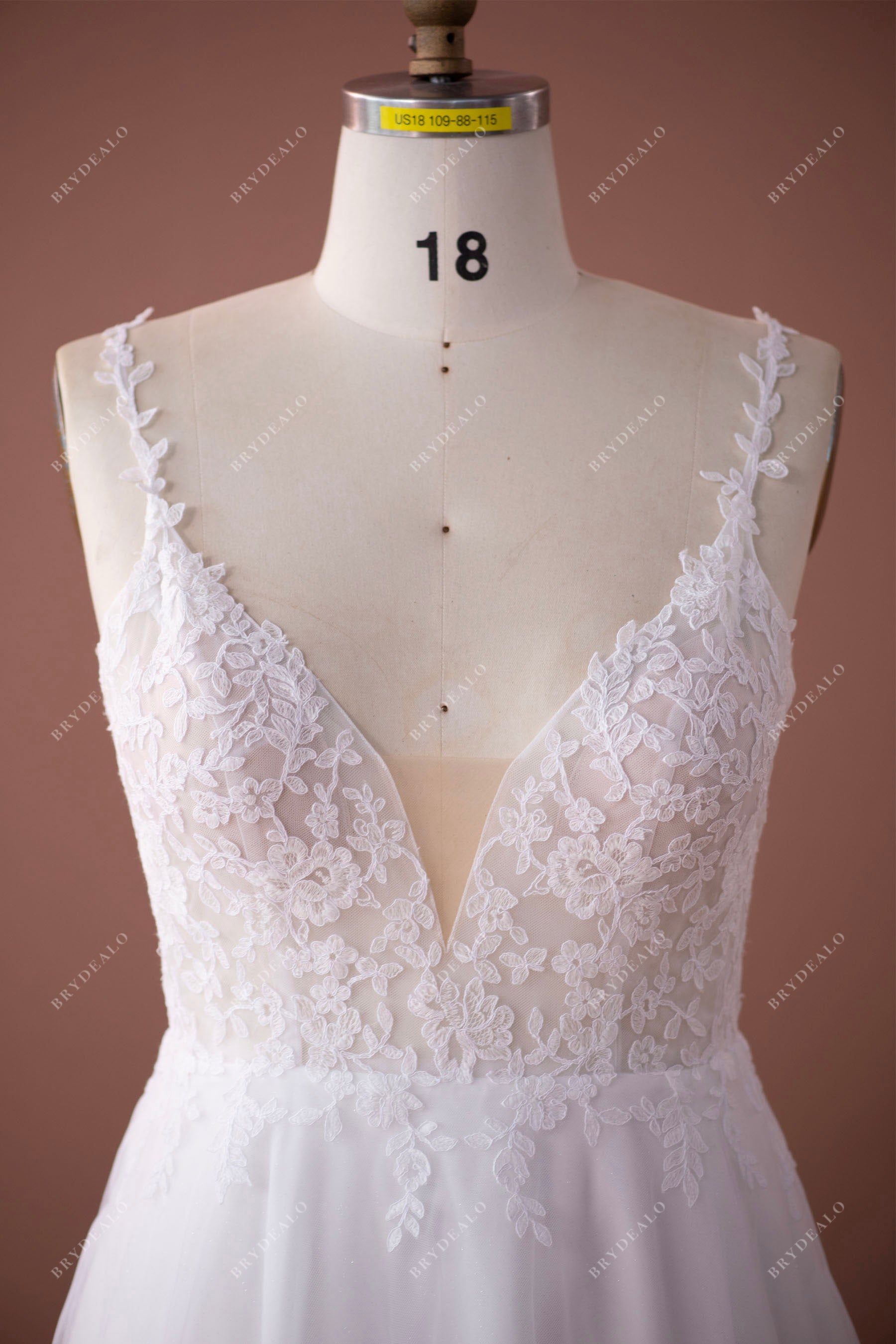 designer spaghetti straps plunging wedding dress