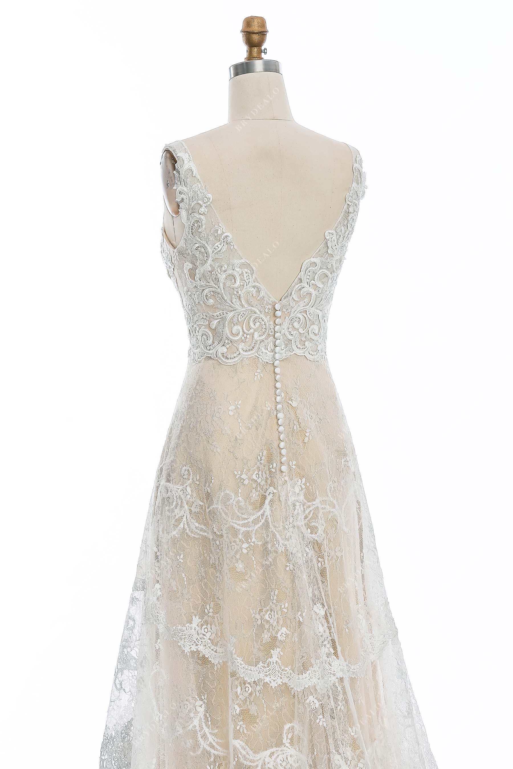 sleeveless lace modern V-back wedding gown
