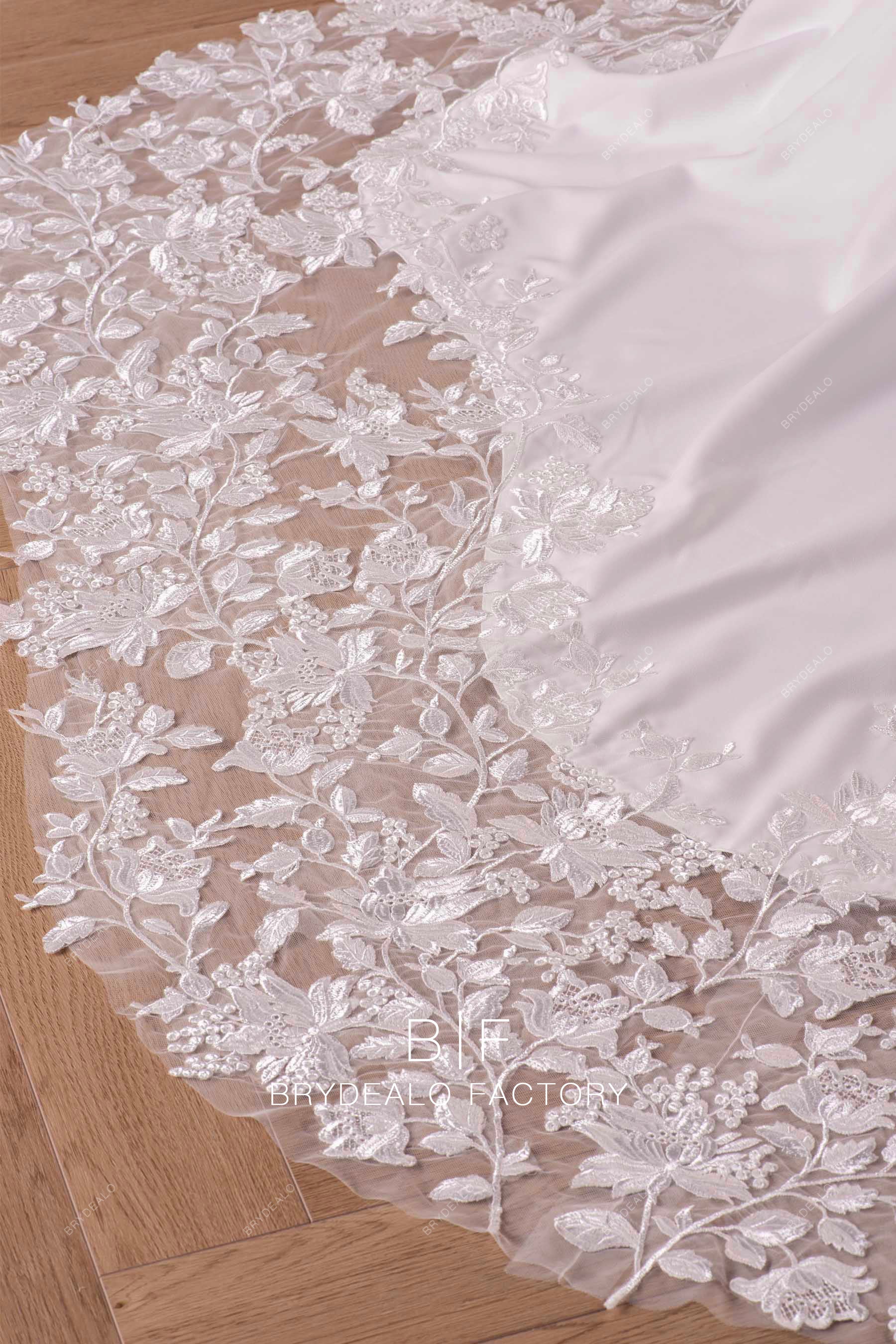 lace cutout long train designer bridal gown