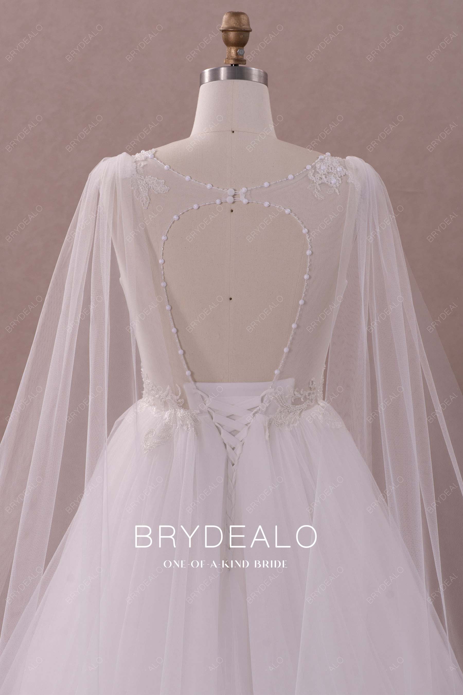 designer cutout back shoulder veil modern wedding gown