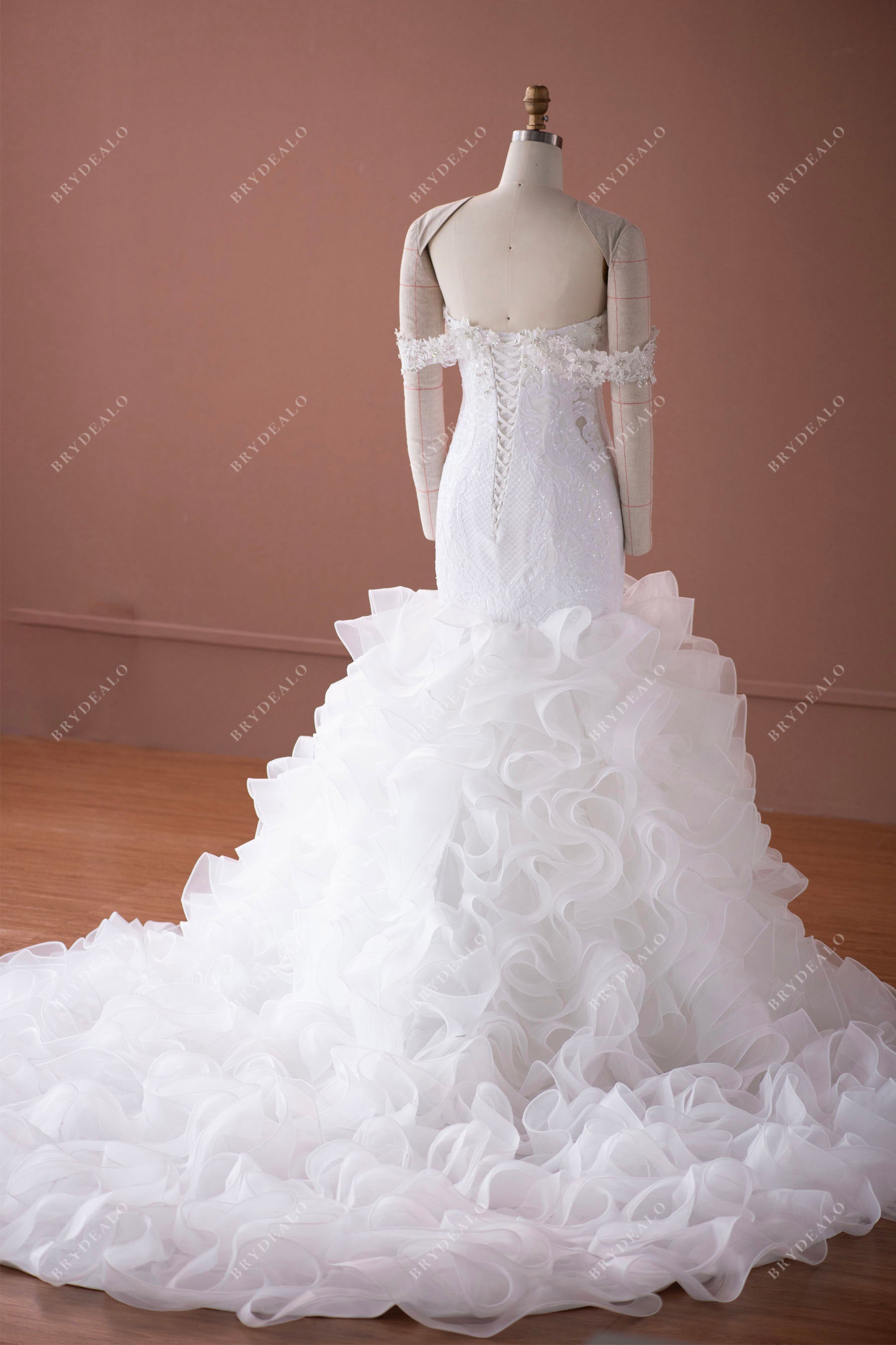 trendy ruffled organza long train trumpet bridal gown