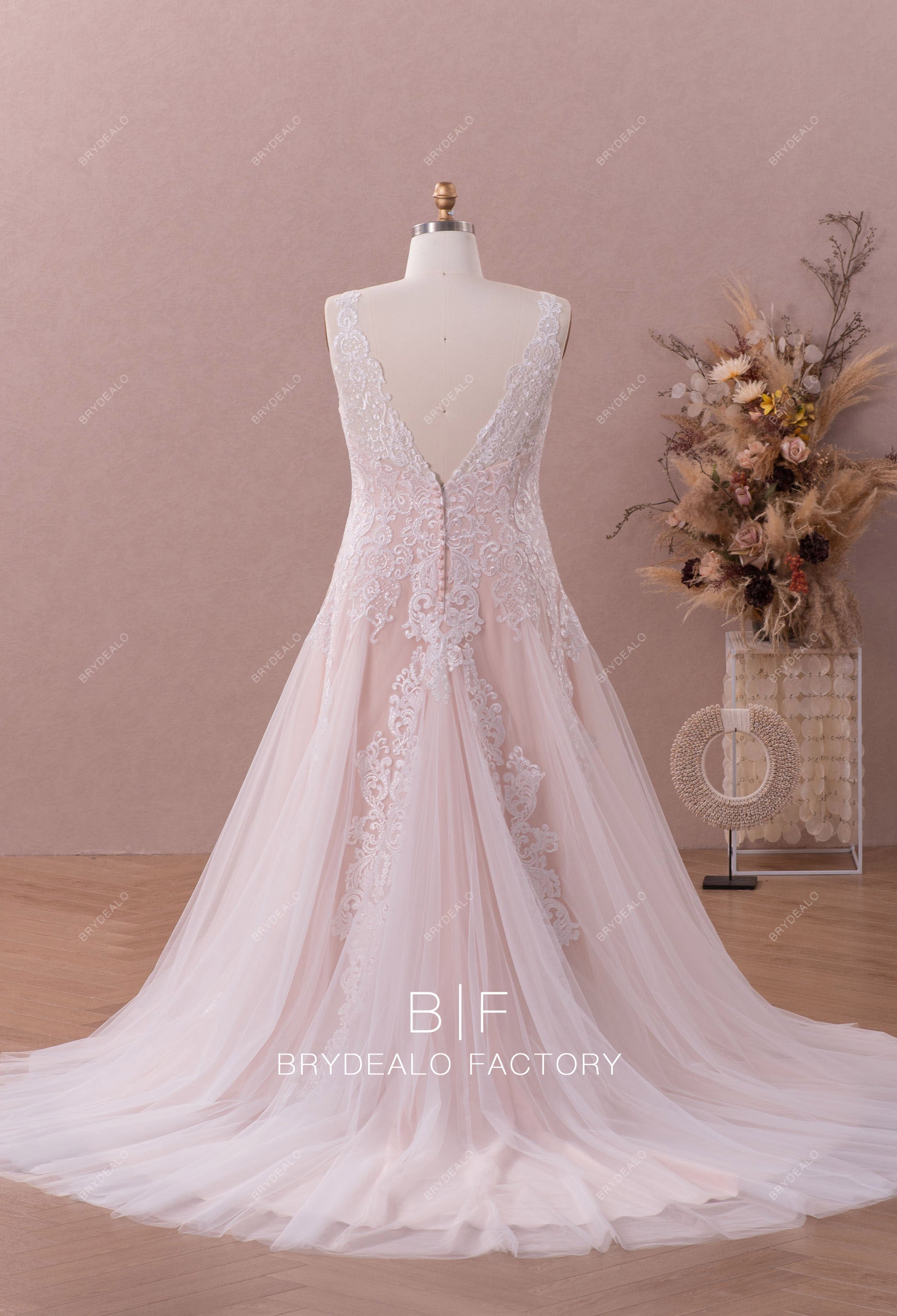 sleeveless V-back fit and flare destination bridal gown