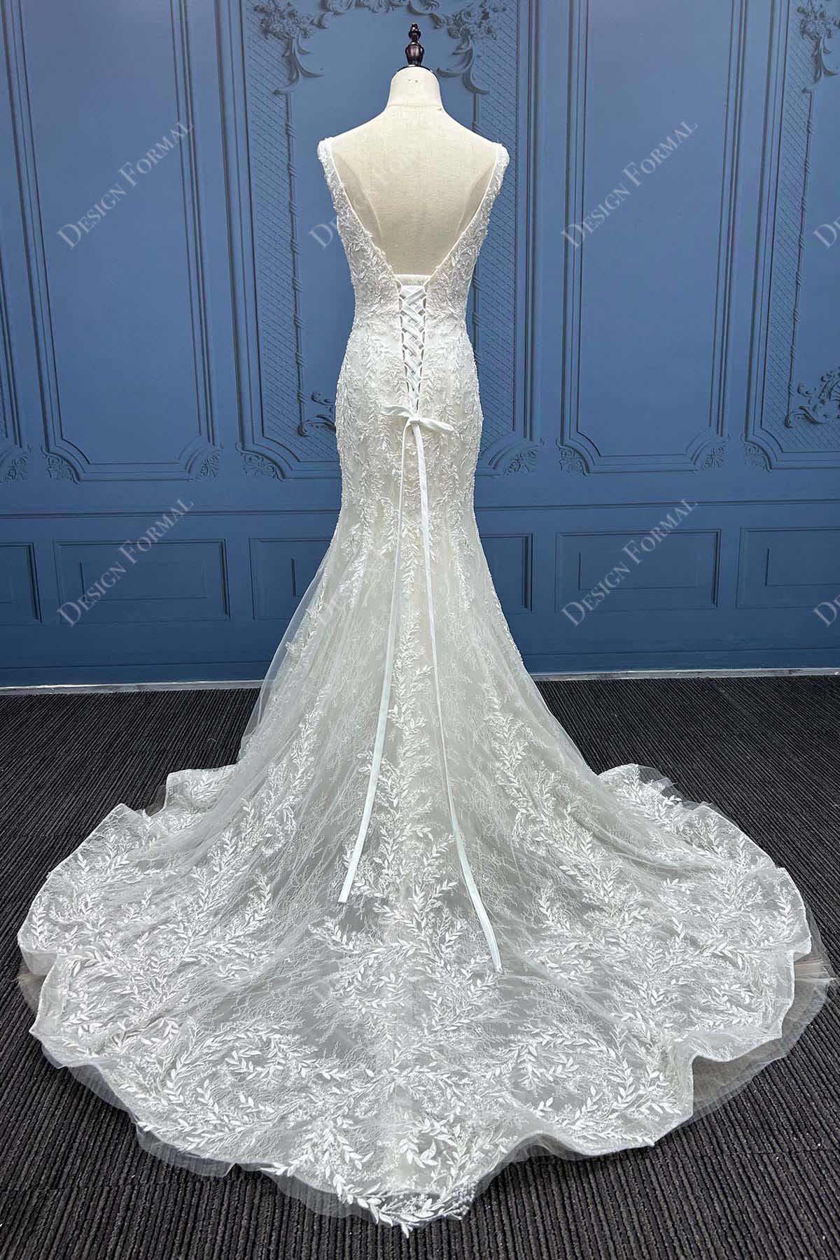 custom open back long train designation bridal gown