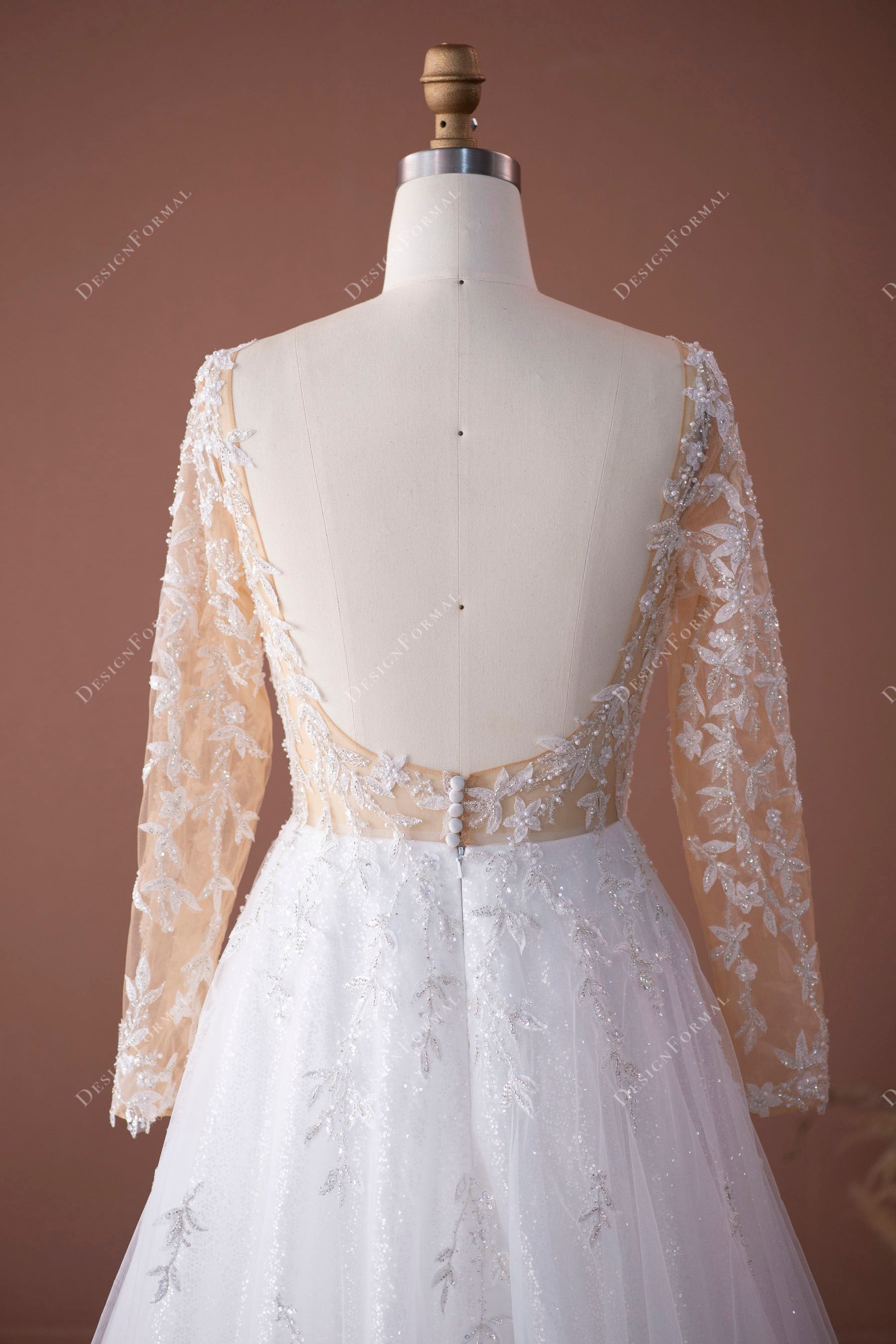 open back sheer sleeved bridal dress