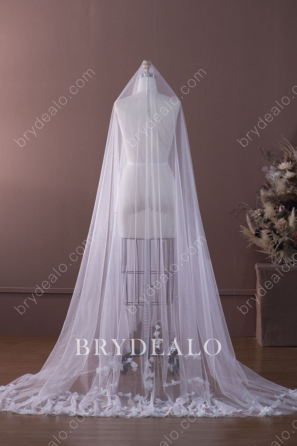 https://designformal.com/cdn/shop/products/pearls-3D-flowers-chapel-length-bridal-veil.jpg?v=1676639600&width=1024