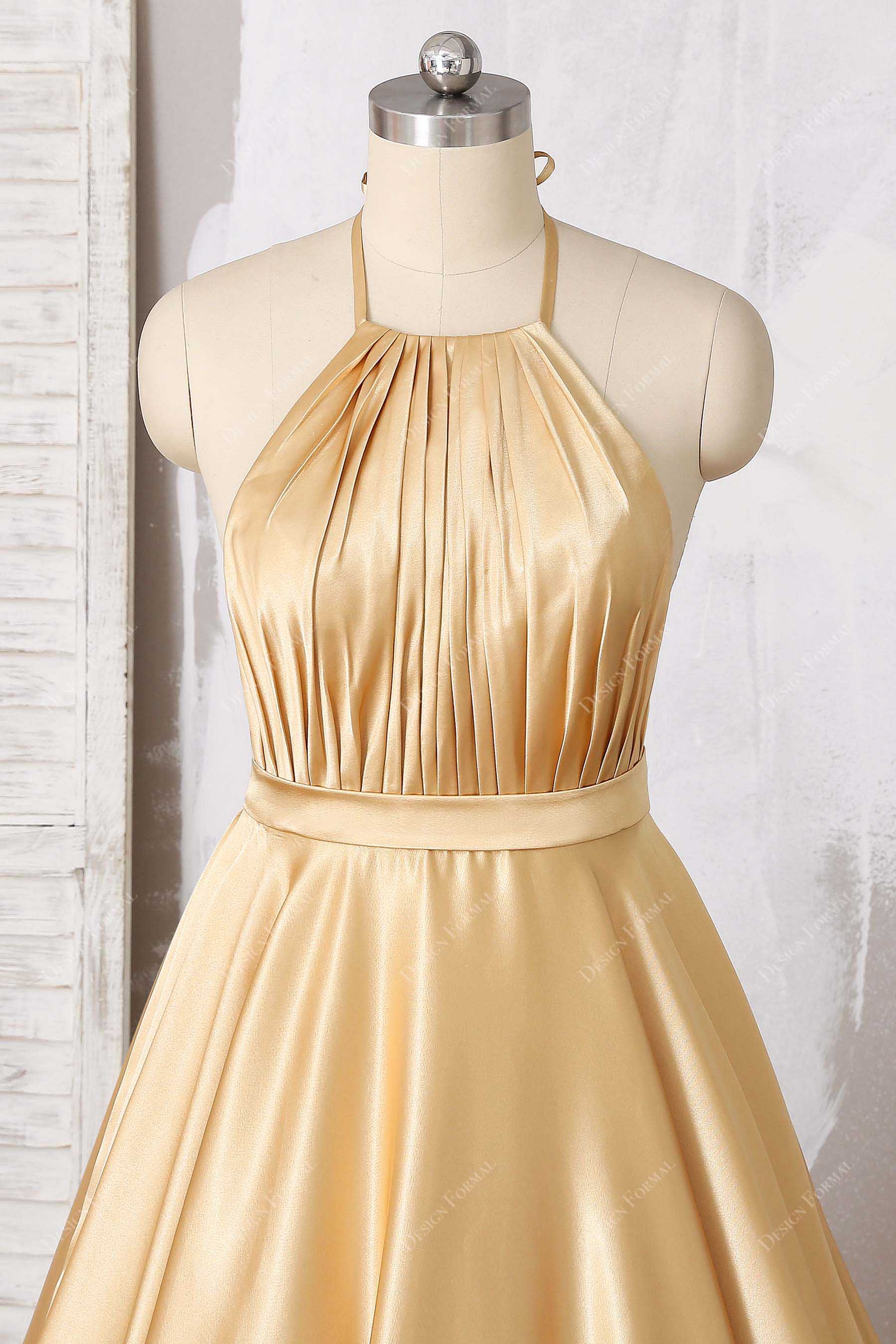 pleated satin gold halter bodice prom gown