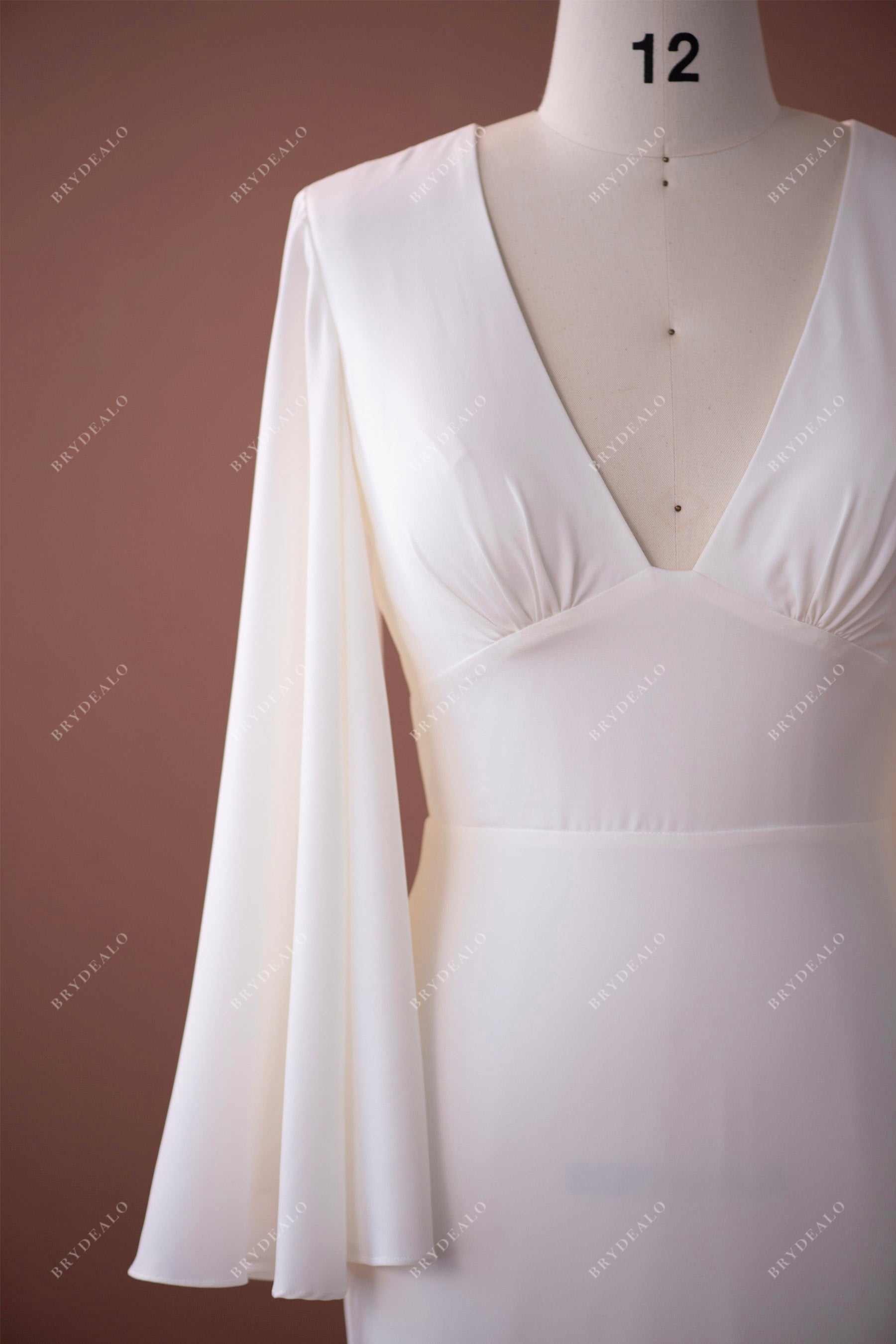 V-neck empire waist bell sleeve wedding gown