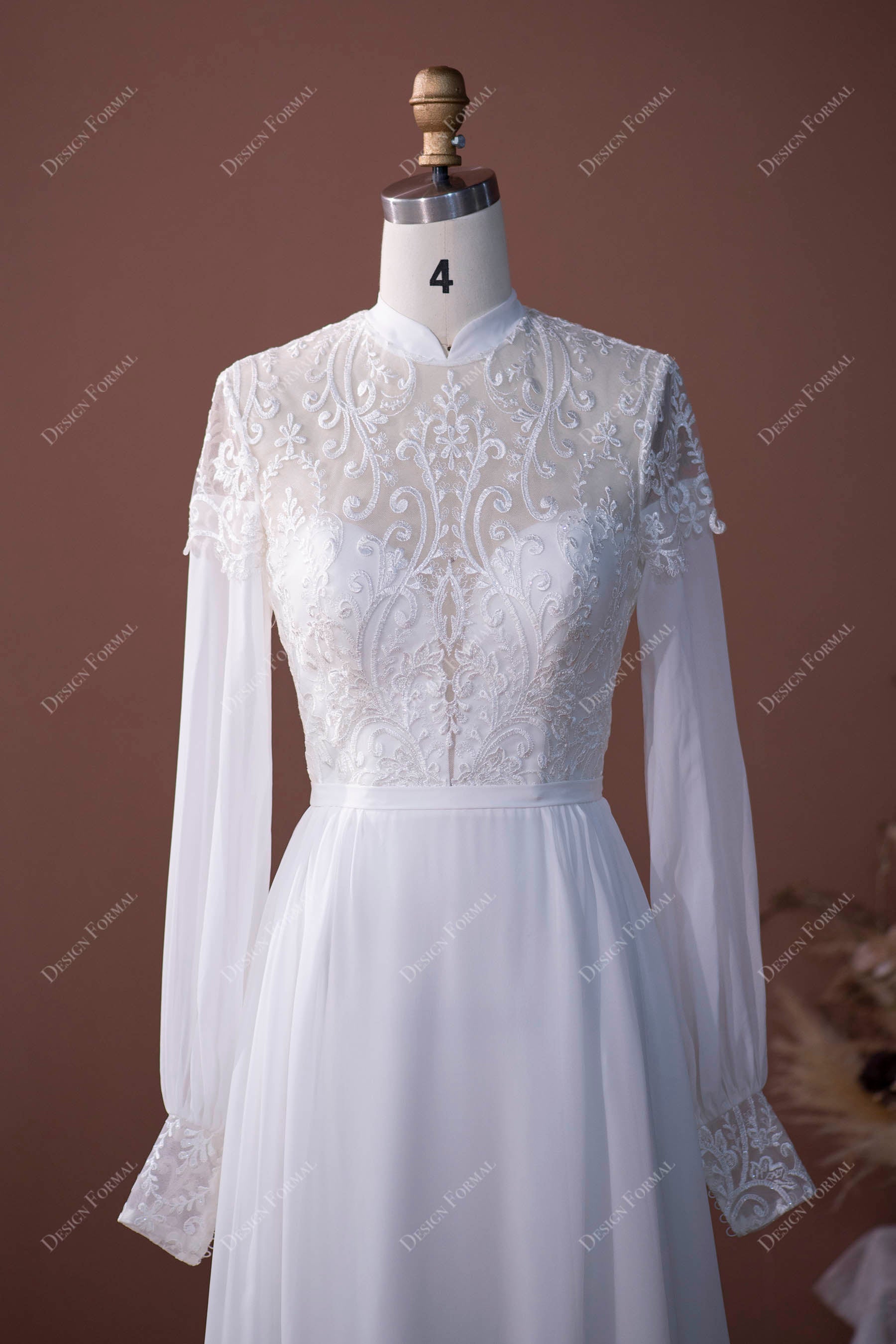 plunging neck lace sheer sleeves bridal gown