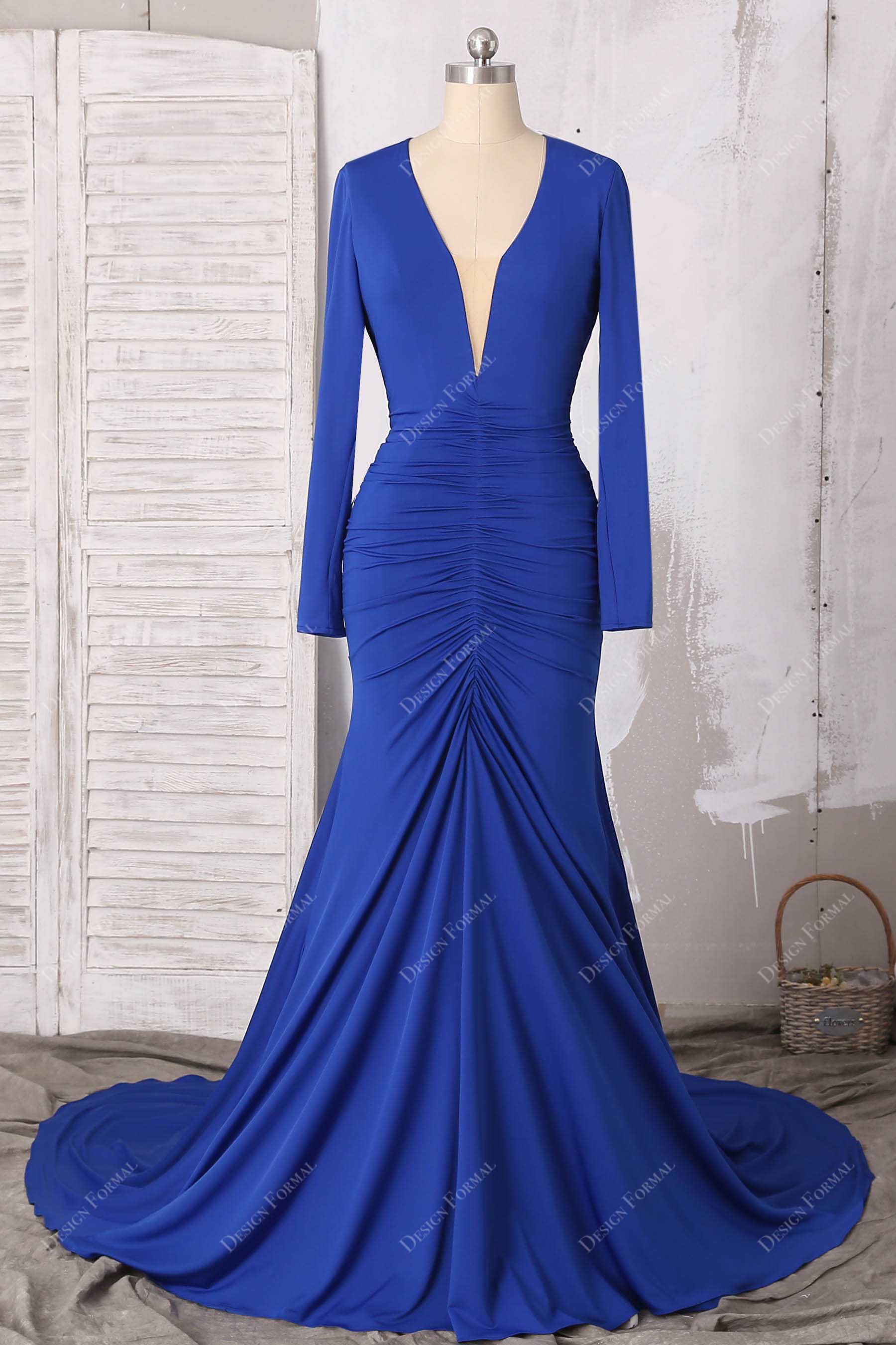 plunging V-neck royal blue jersey mermaid prom gown