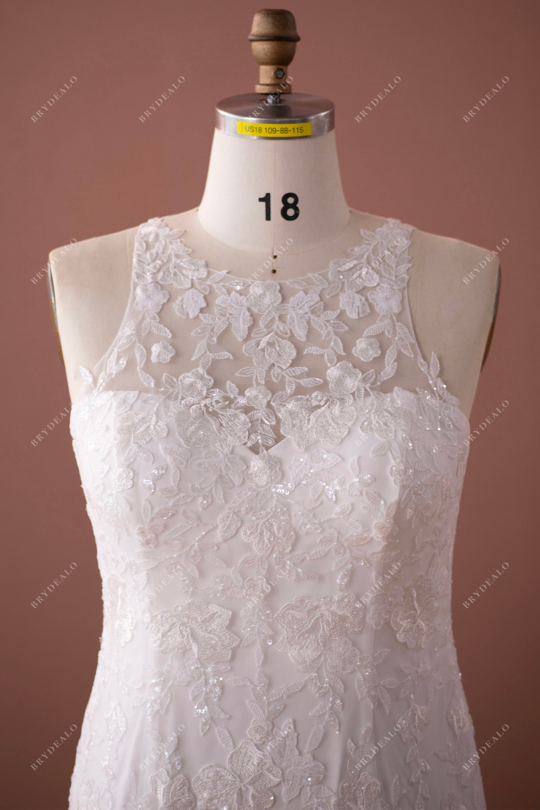 sleeveless designer lace plus size halter wedding gown