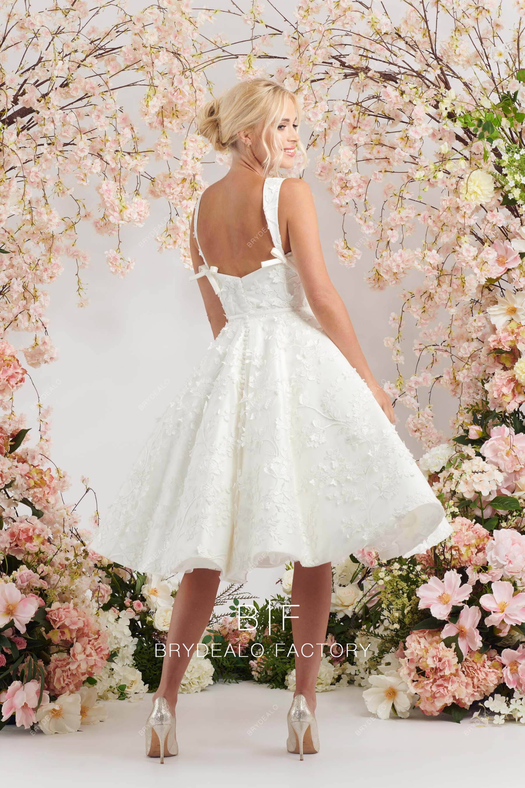 cute puffy A-line open back lace wedding gown