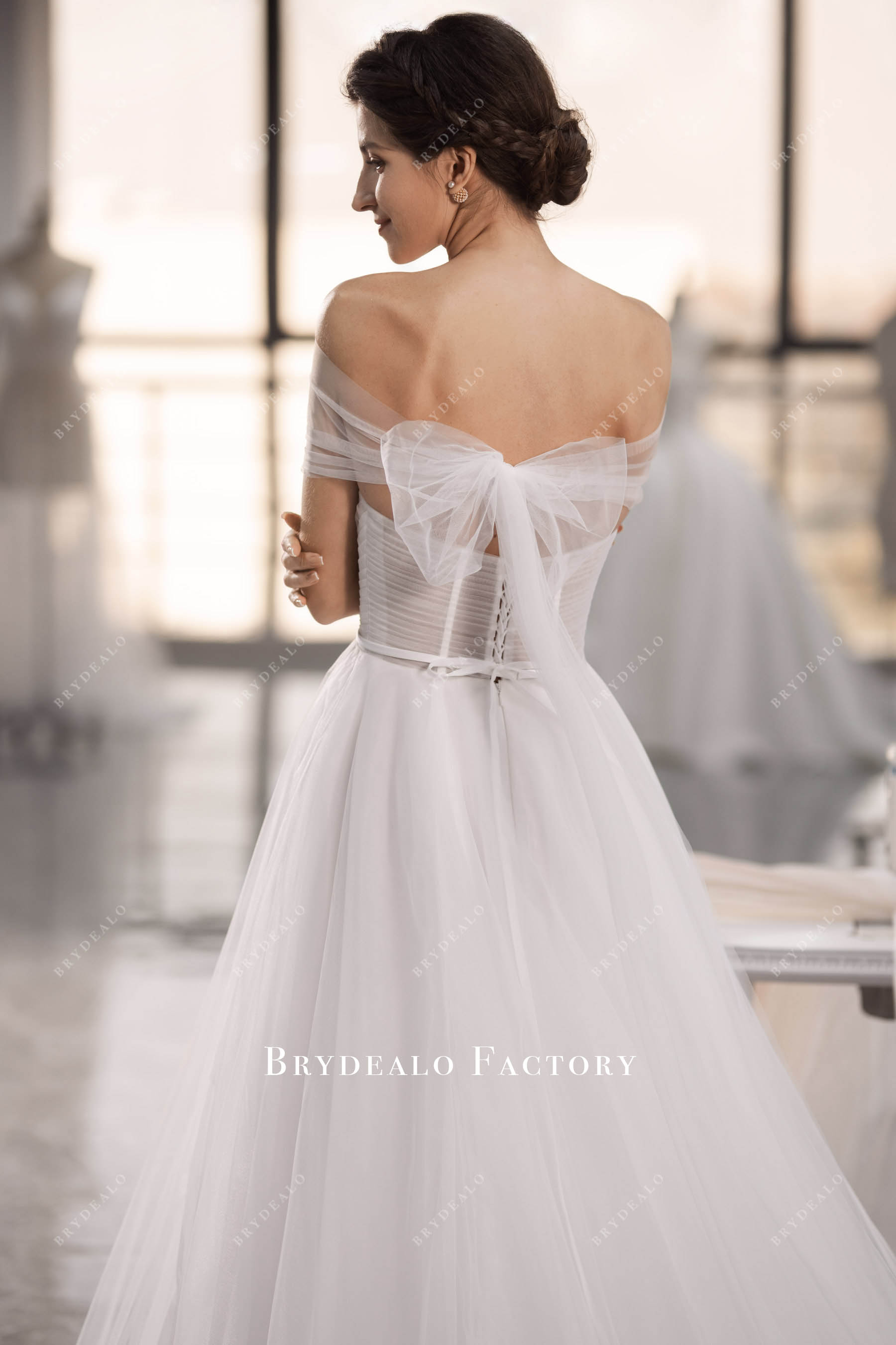 removable tulle wrap white wedding gown