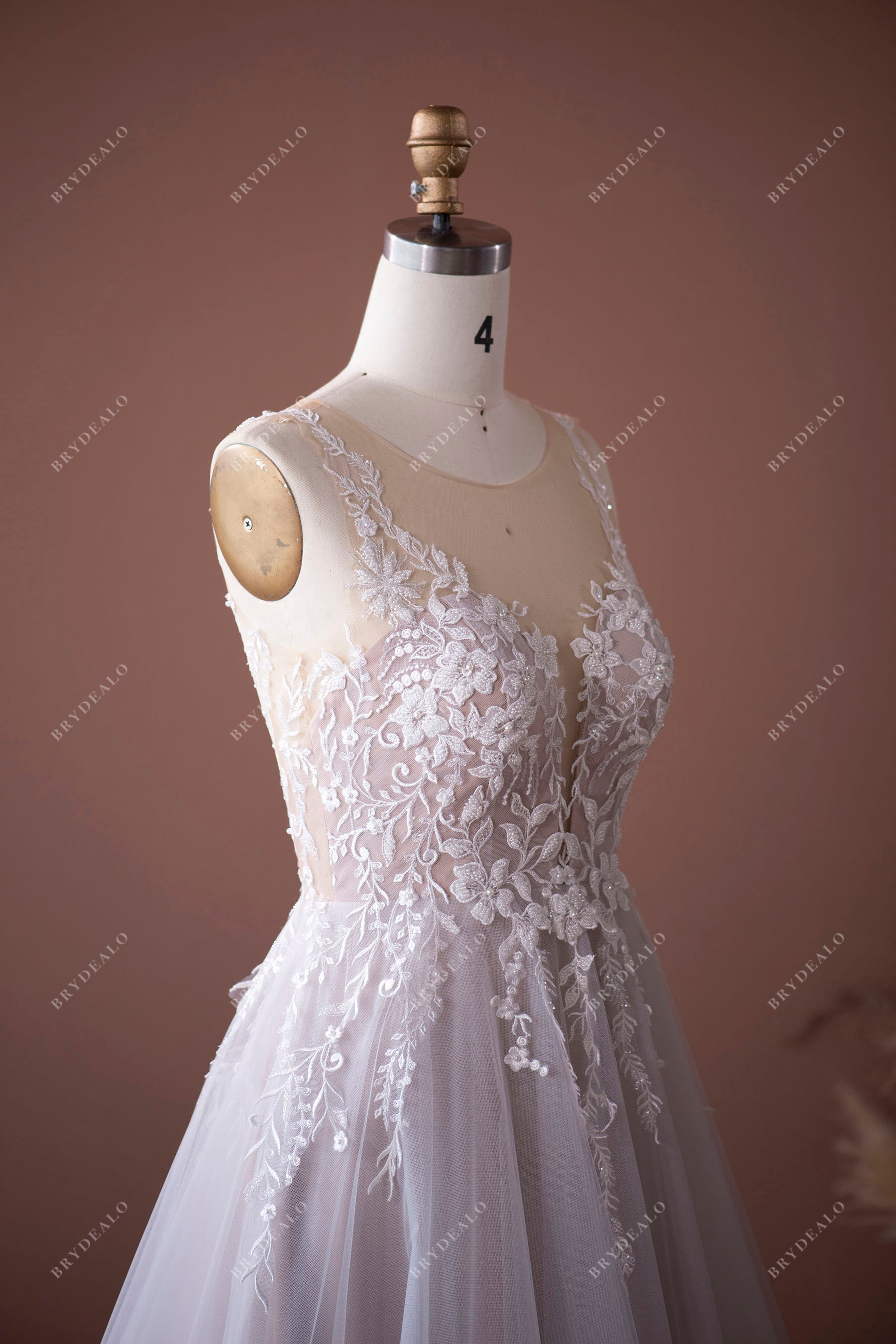 trendy sleeveless beaded lace bridal gown 