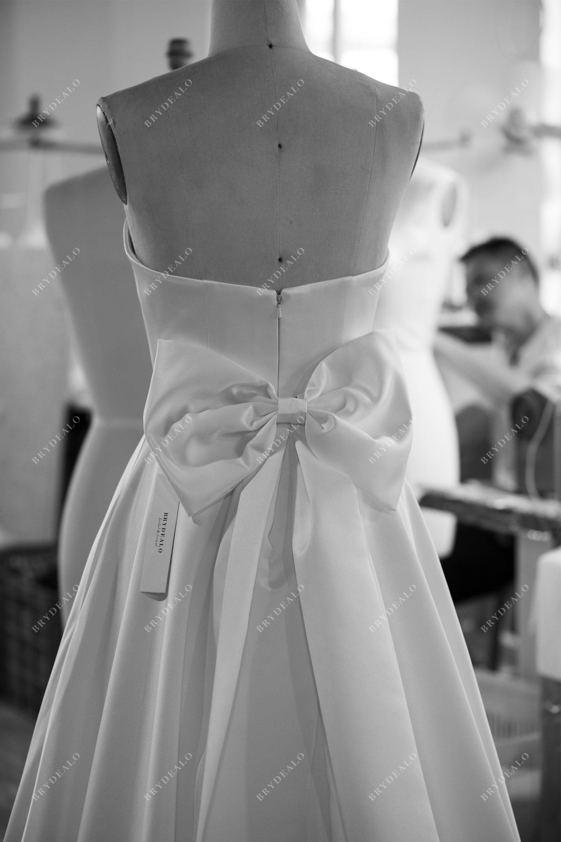 designer satin strapless wedding dress with bowknot