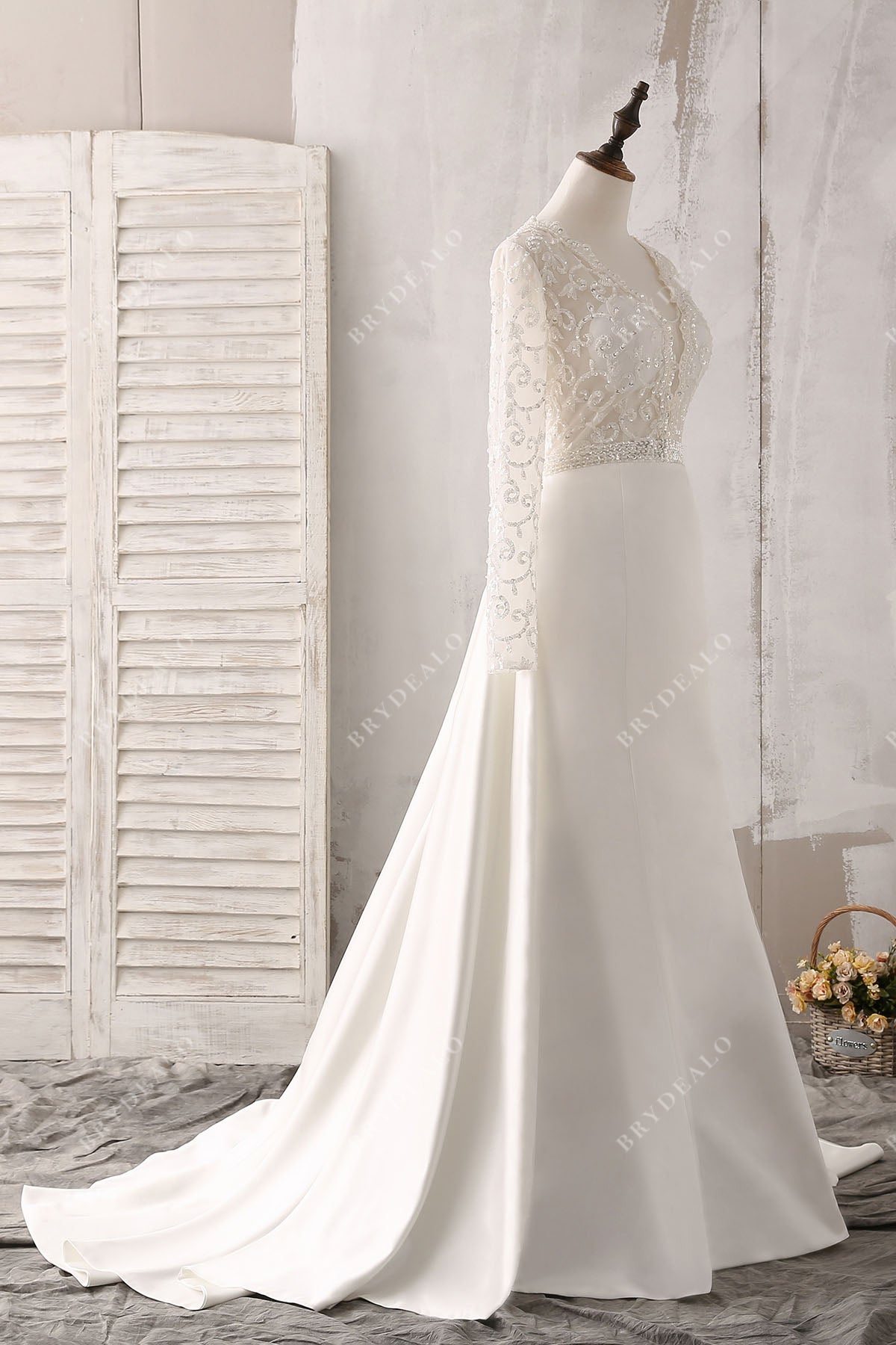 sheer long sleeves lace demure satin wedding gown