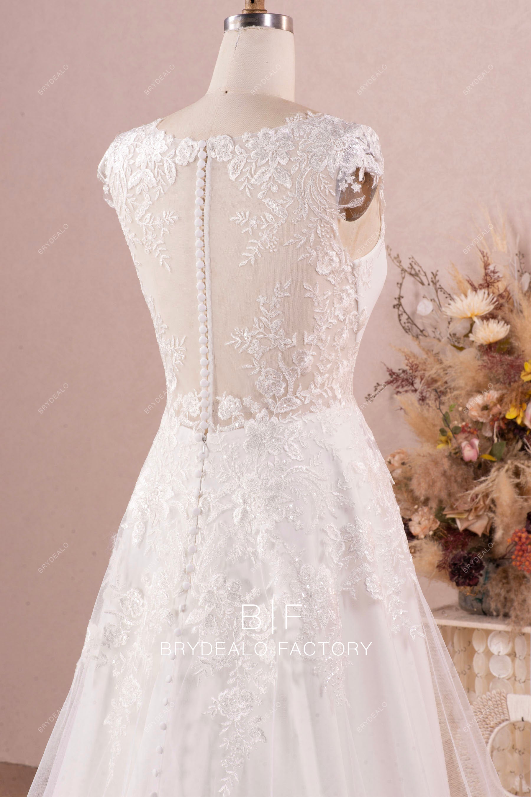 sheer cap sleeve lace overskirt modern wedding dress