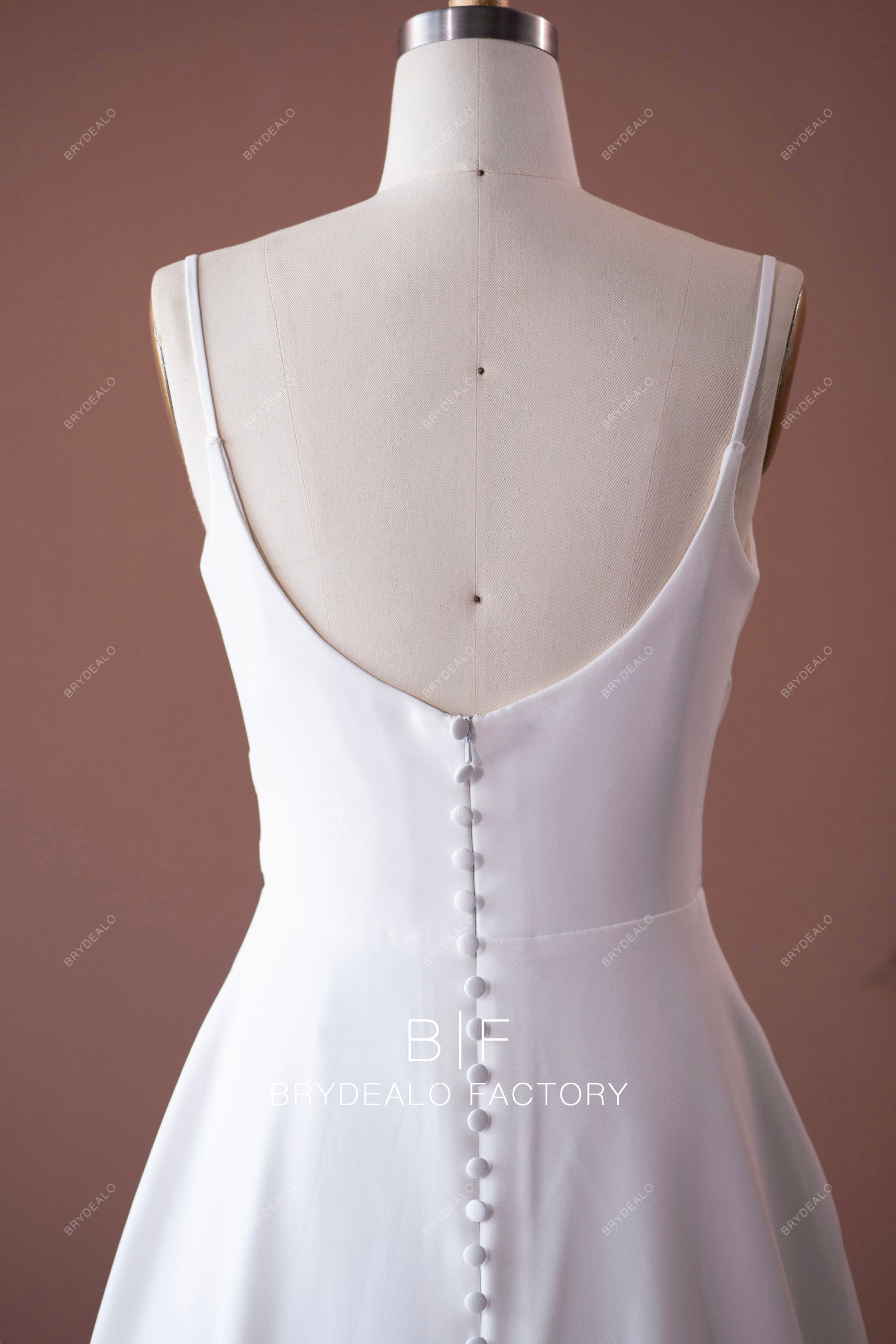 open back sleeveless designer crepe wedding dress