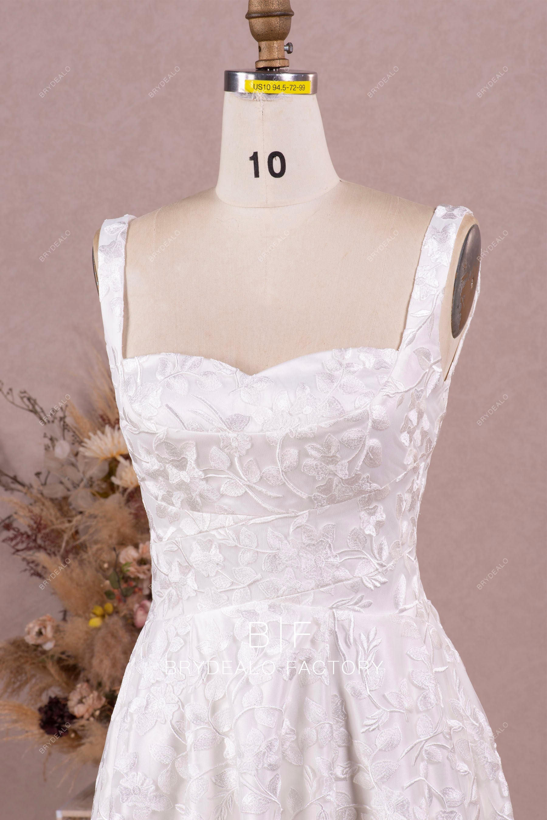 sleeveless sweetheart neck designer lace wedding gown