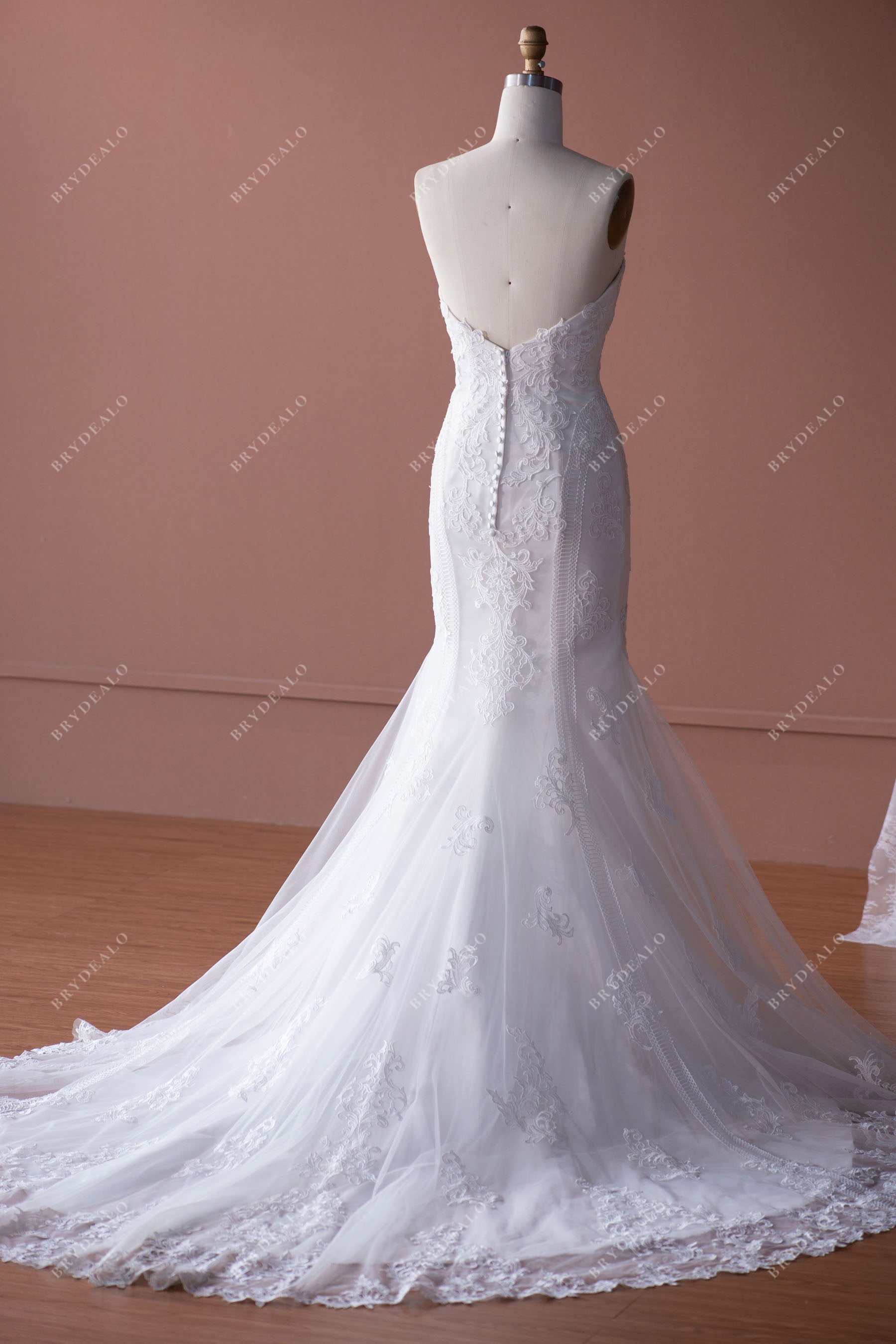 strapless lace mermaid wedding dress with long train