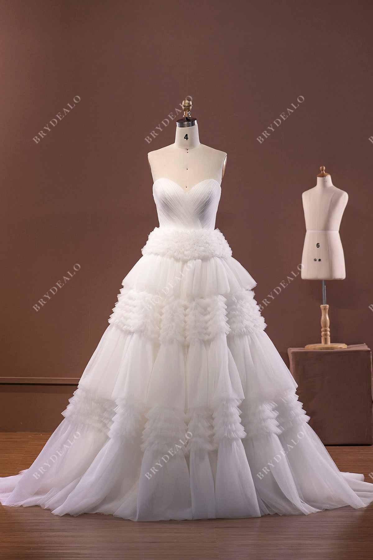 designer strapless pleated bridal ball gown