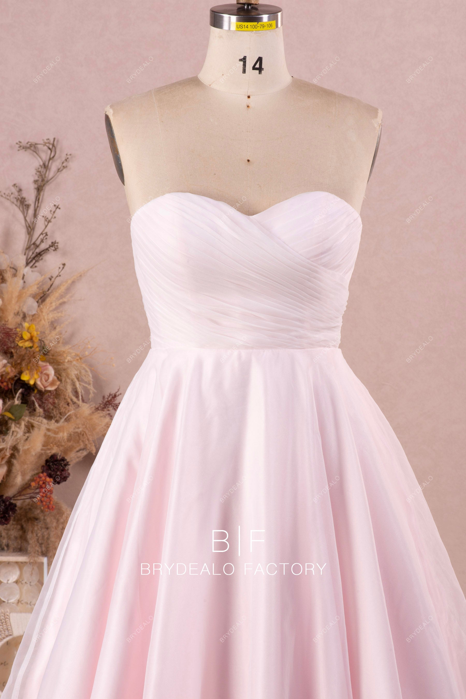strapless sweetheart pleated blush wedding gown