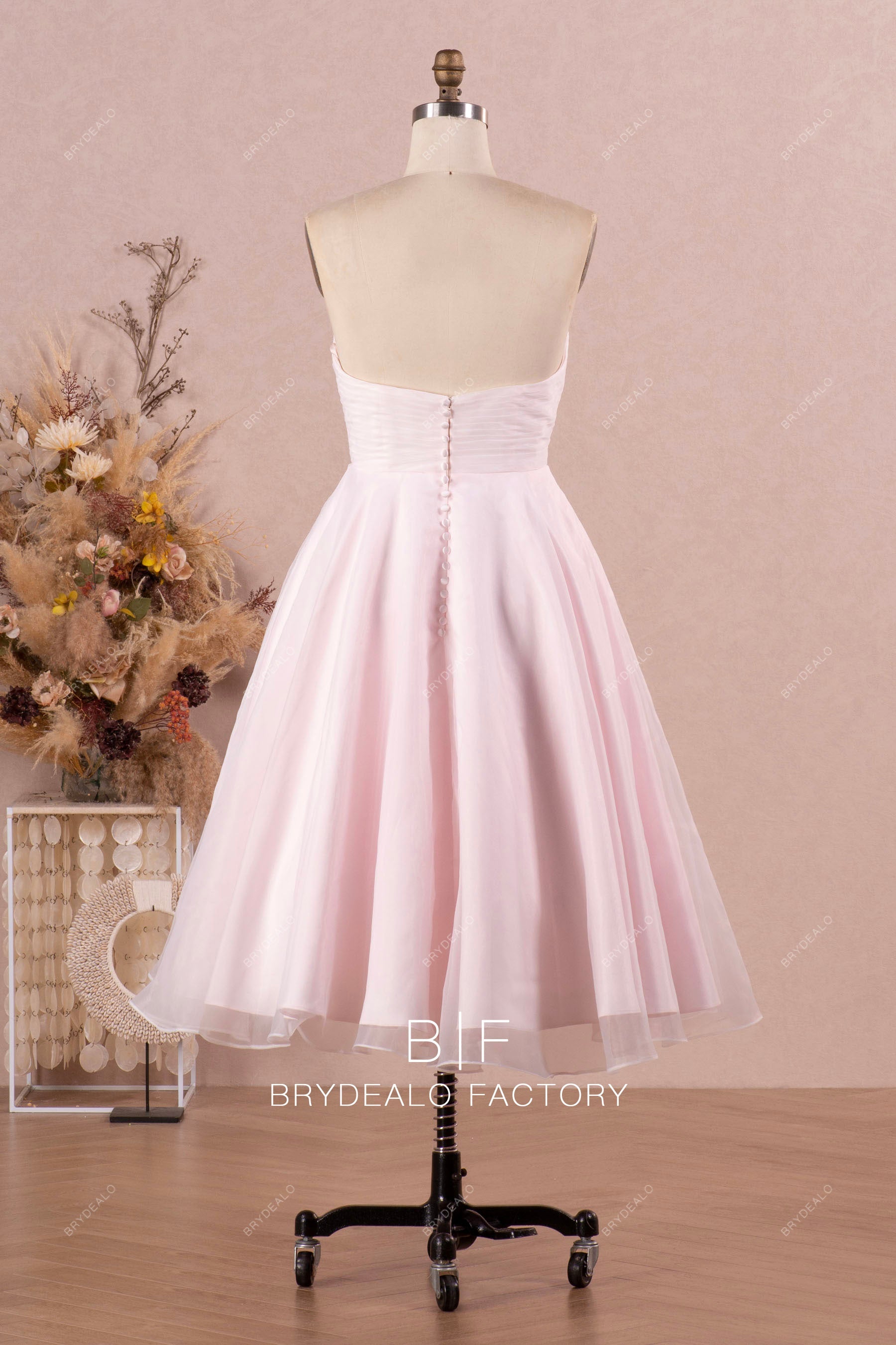blush strapless tea-length organza wedding dress