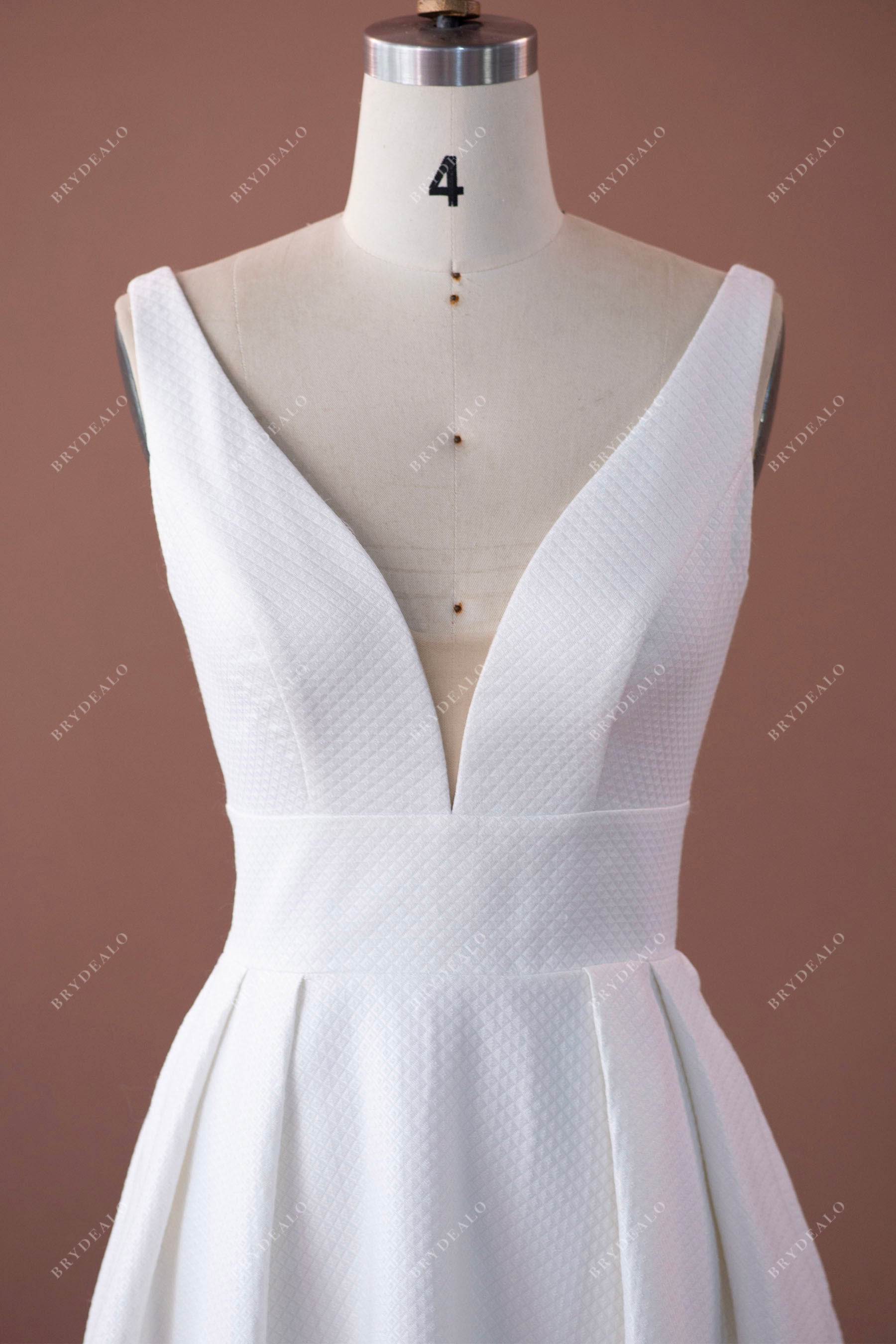 designer sleeveless V-neck bridal gown