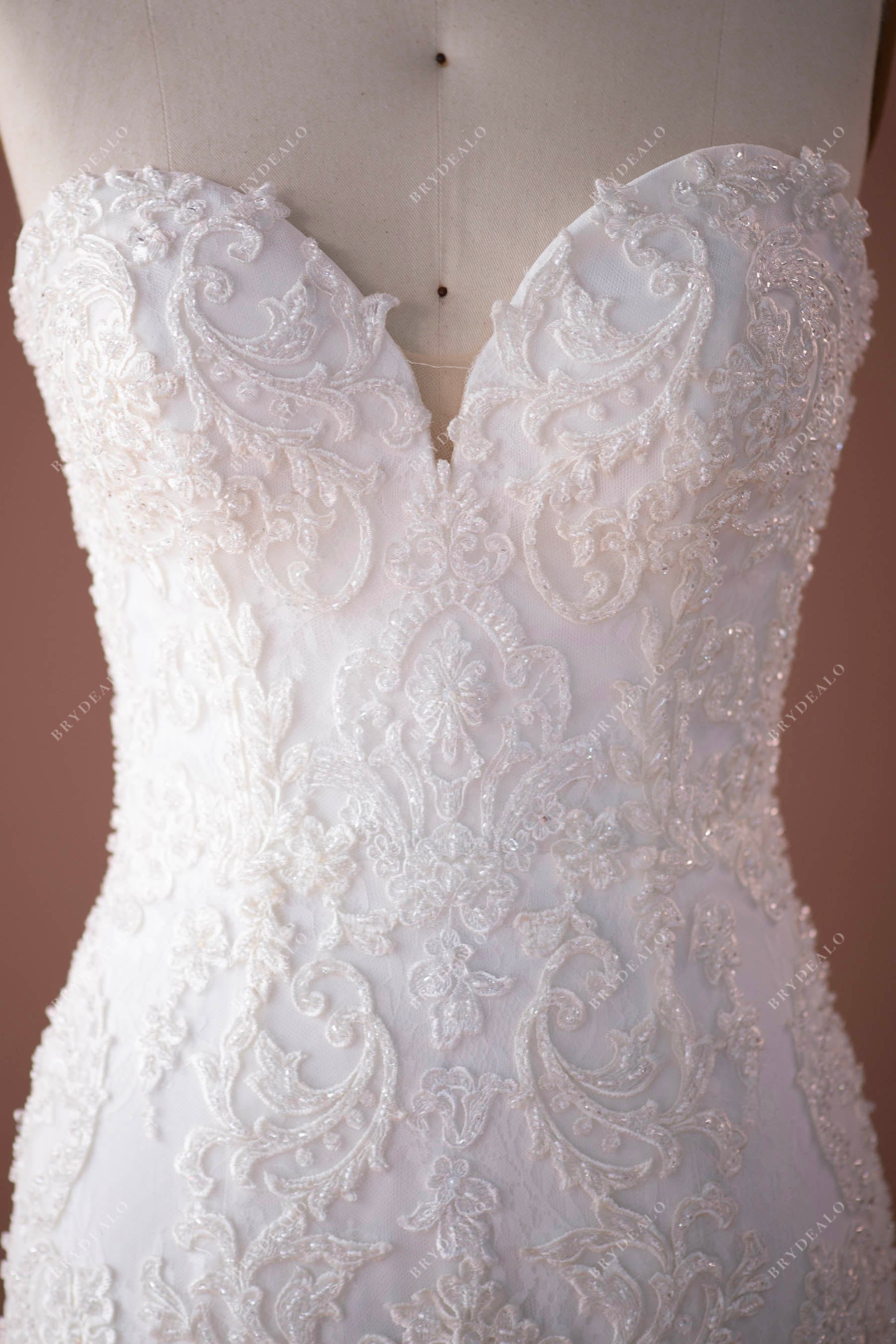 designer beaded lace sweetheart neck bridal gown