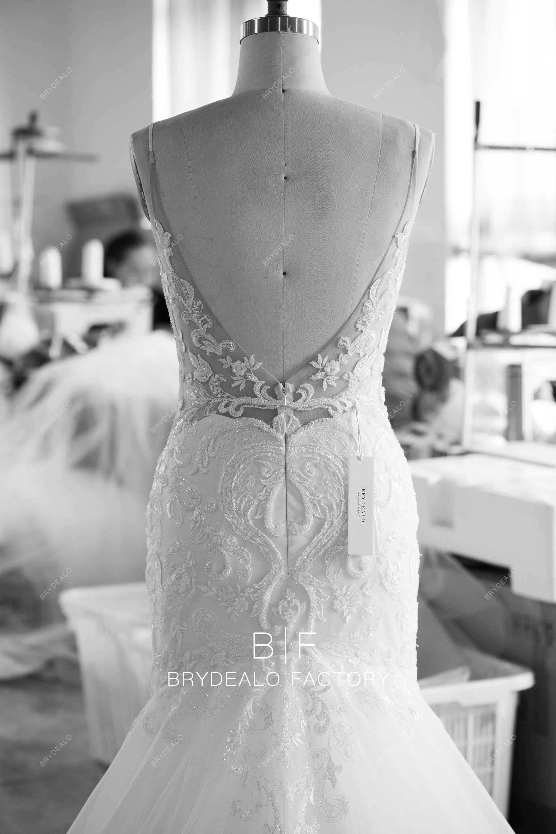tailored sleeveless open back lace tulle wedding dress