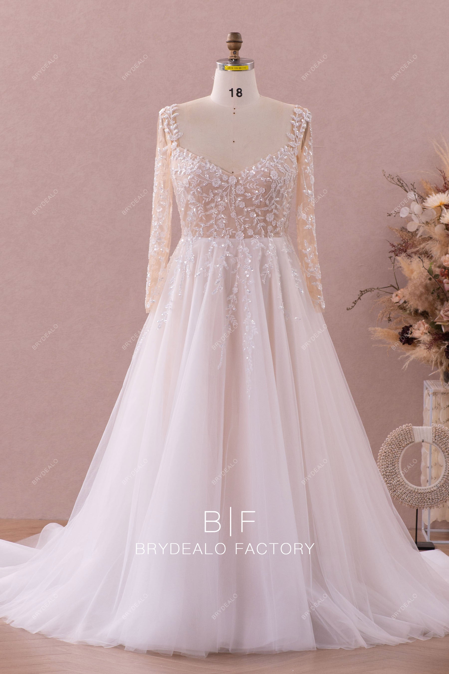 v-neck sleeved beaded lace wedding dress