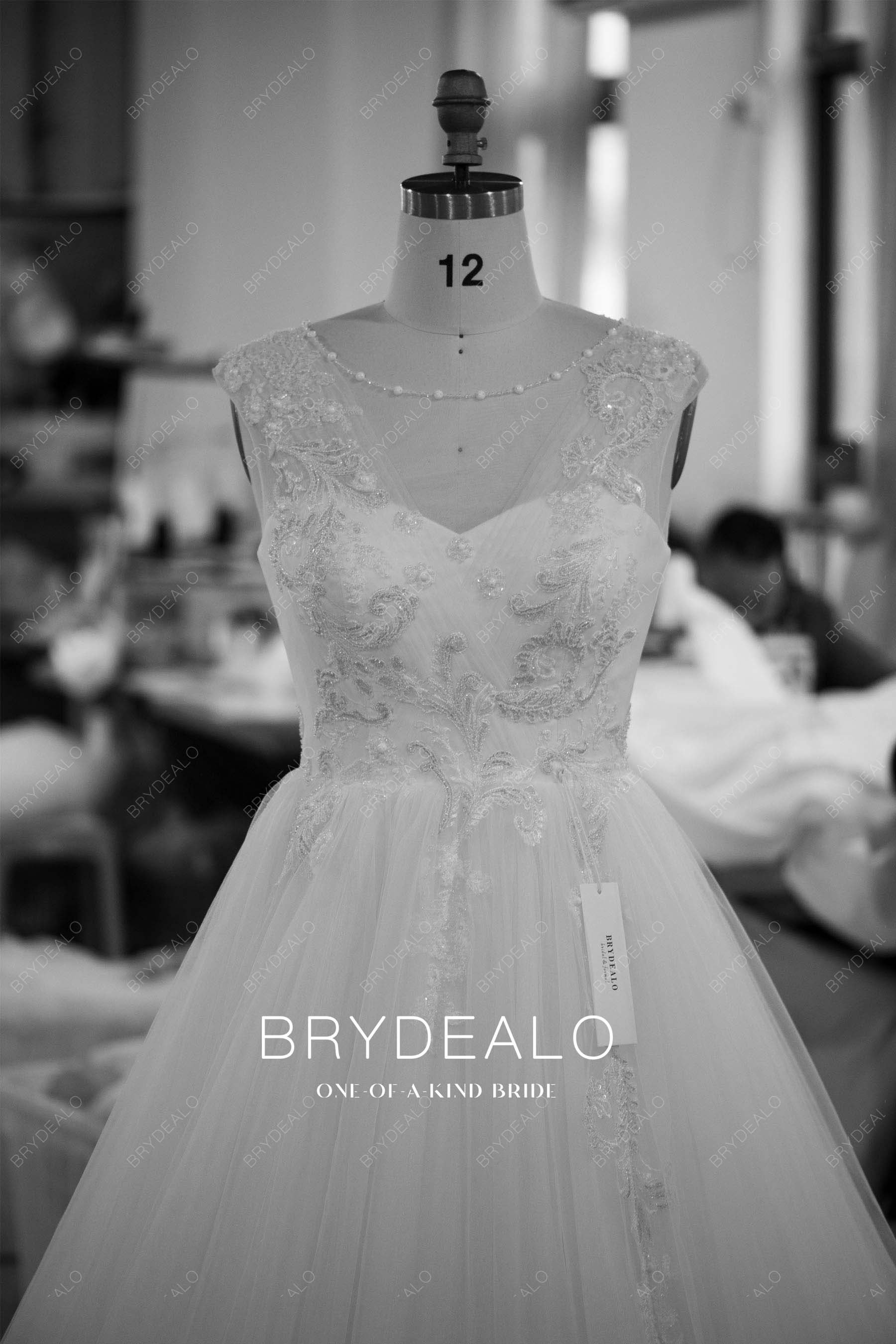 custom beaded illusion neck wedding gown