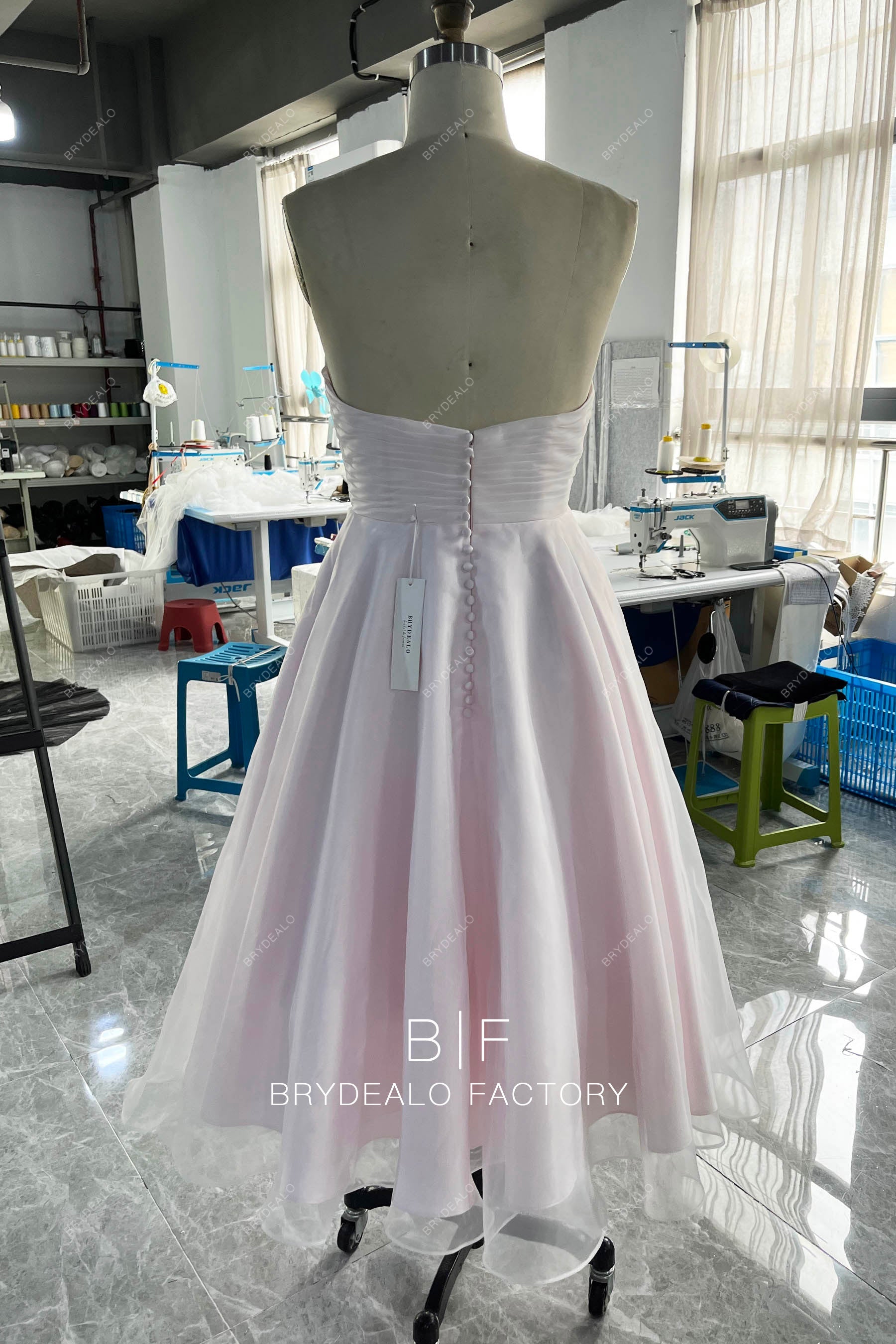 designer blushing tea length short bridal dress