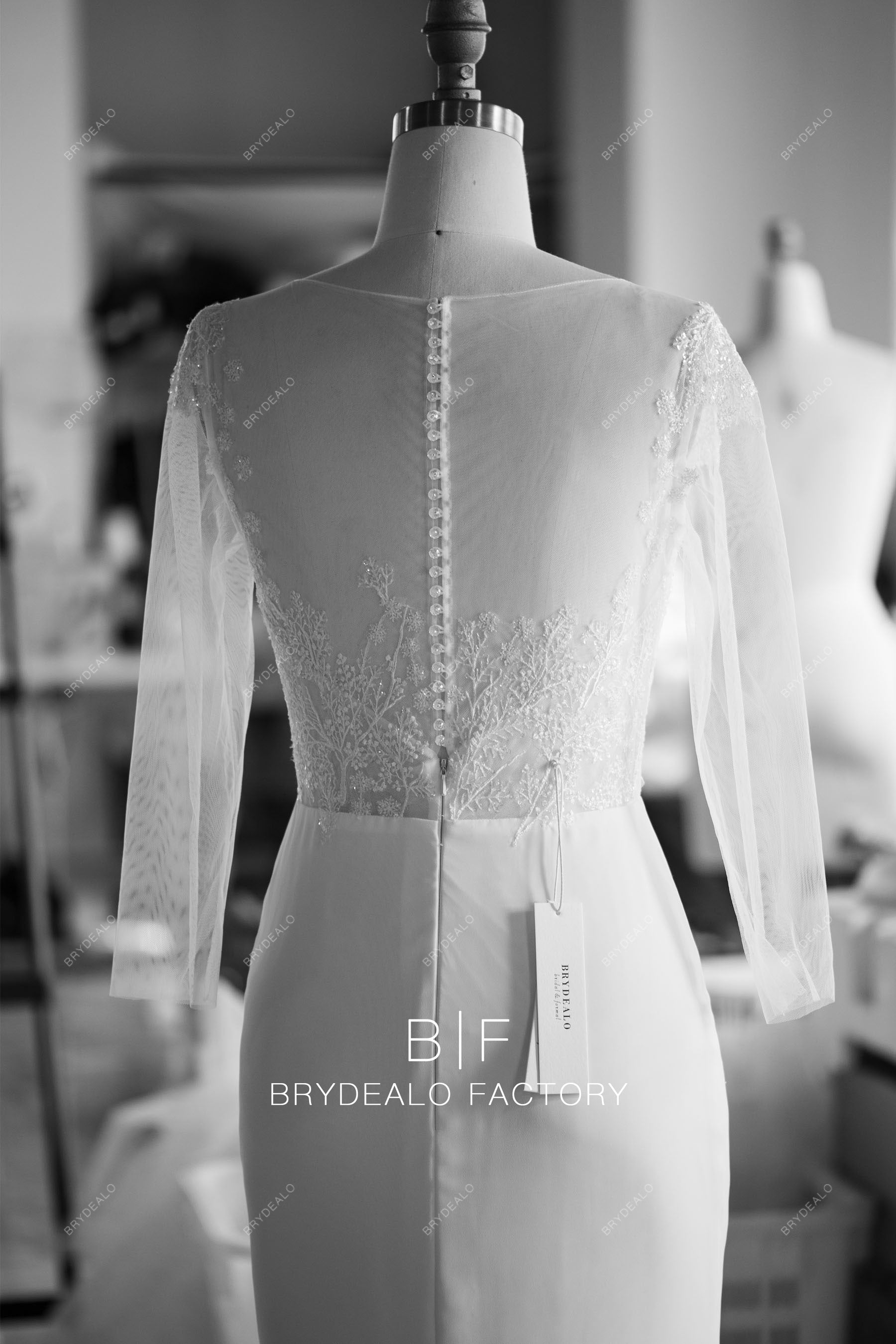 custom buttoned lace back wedding dress