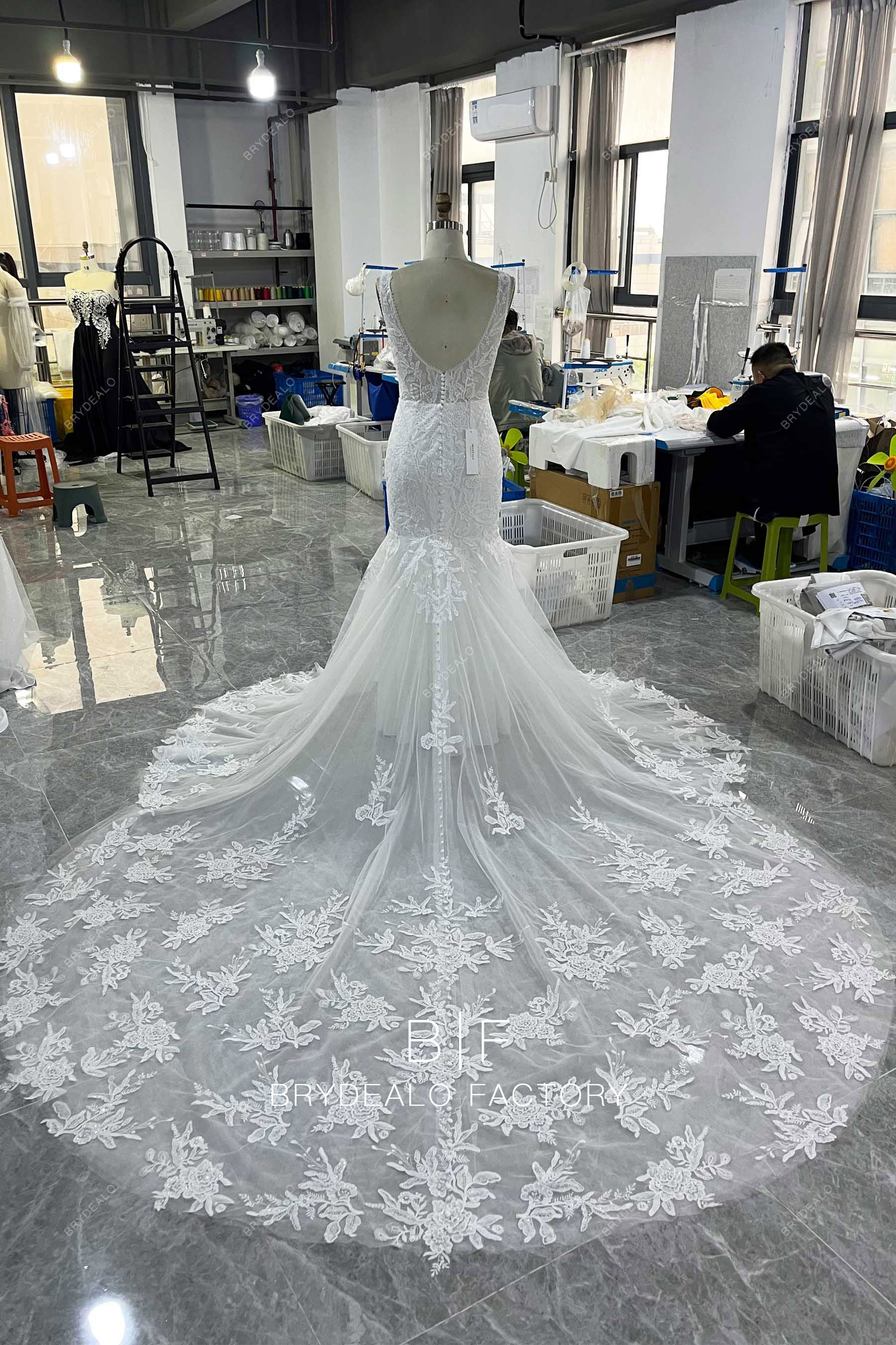 hand-made long train designer lace wedding dress