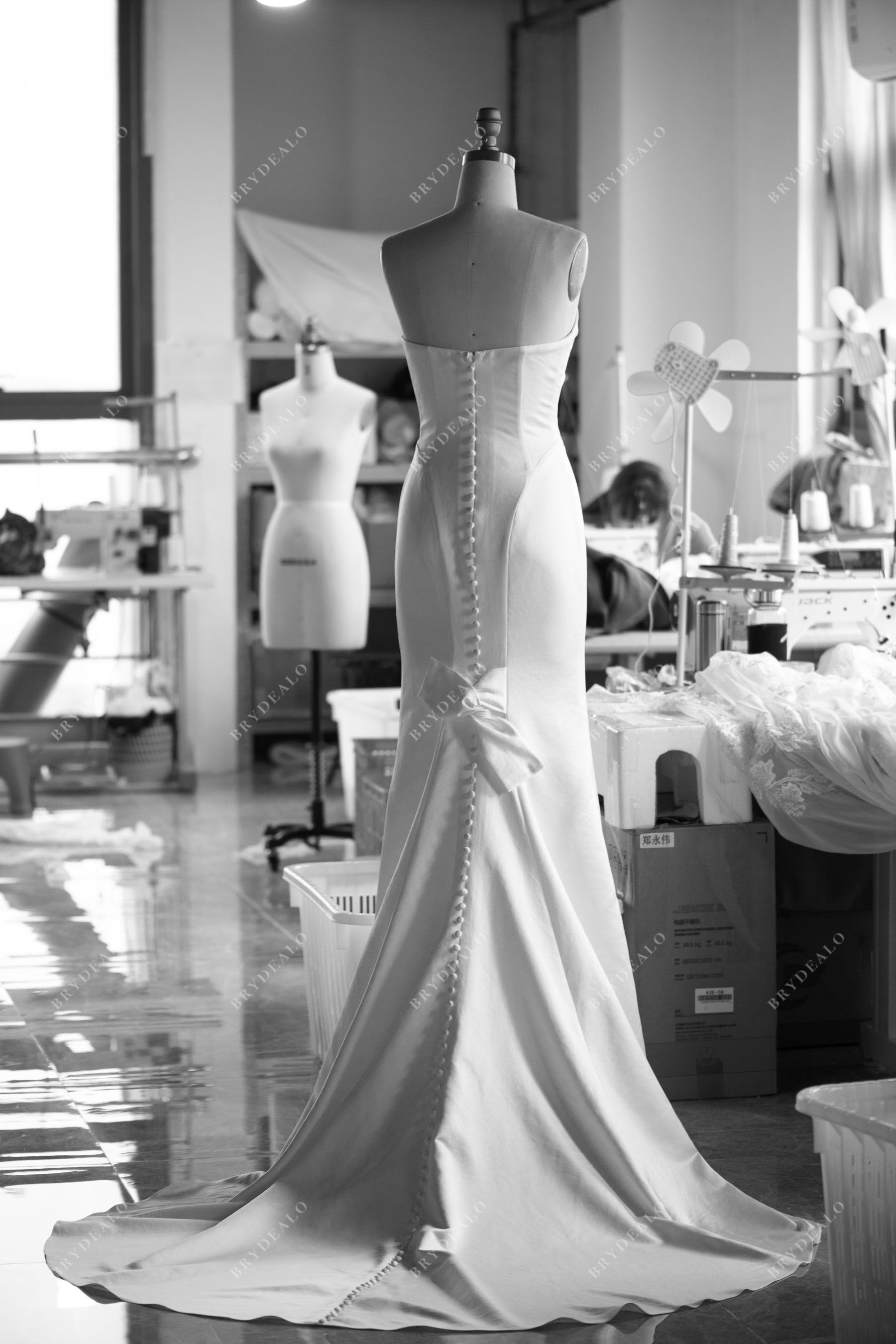 designer strapless satin mermaid bridal gown