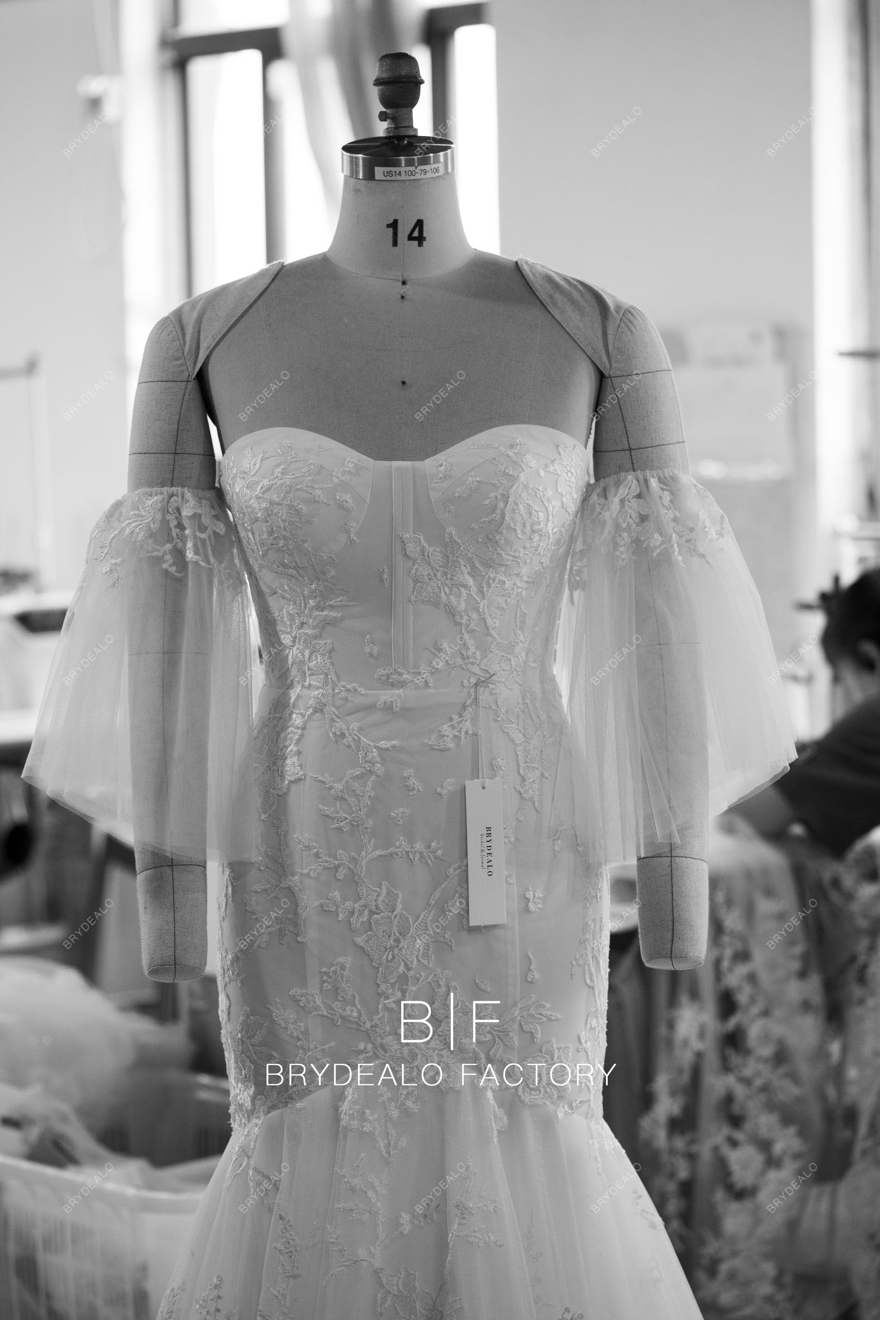 designer flutter sleeve lace mermaid bridal gown