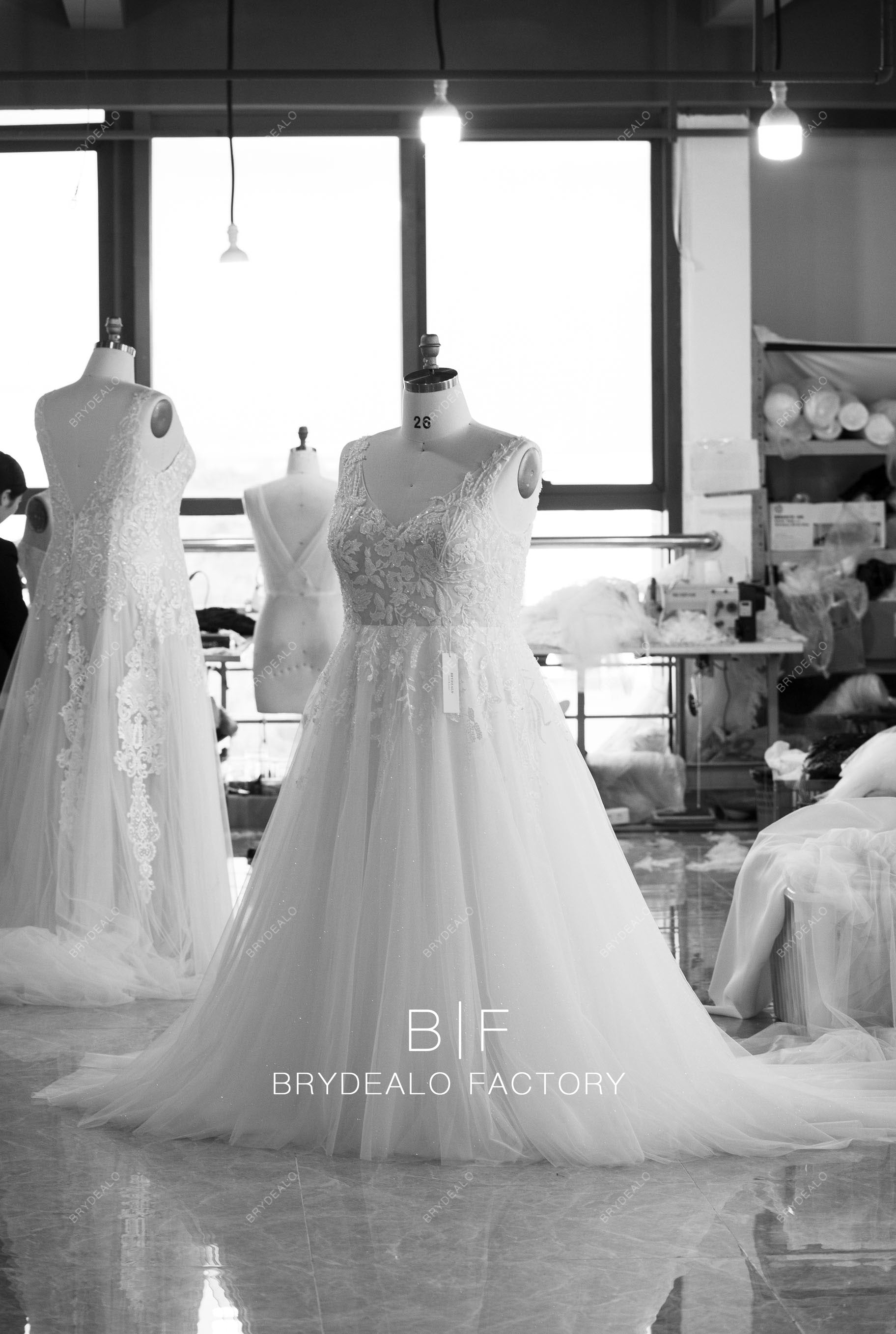 tailored hand-sewn beading lace wedding gown