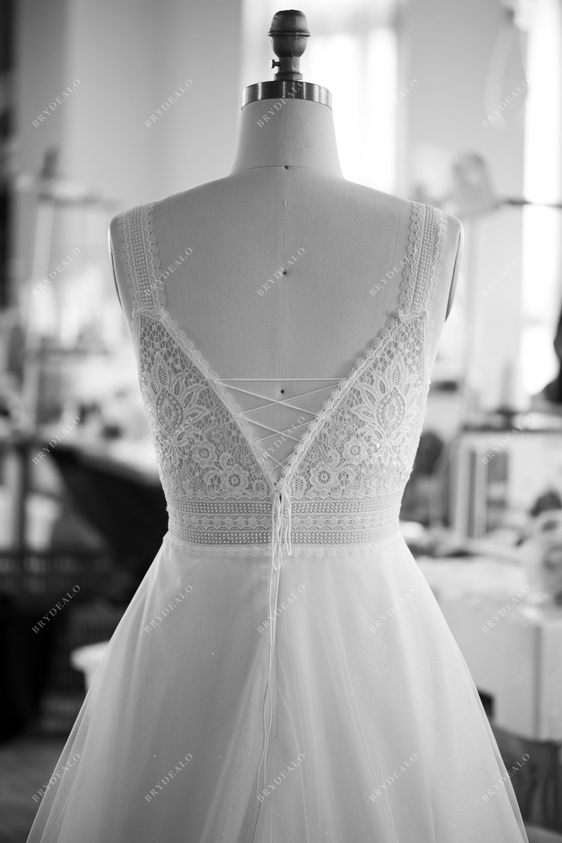 tailored lace up back wedding dress