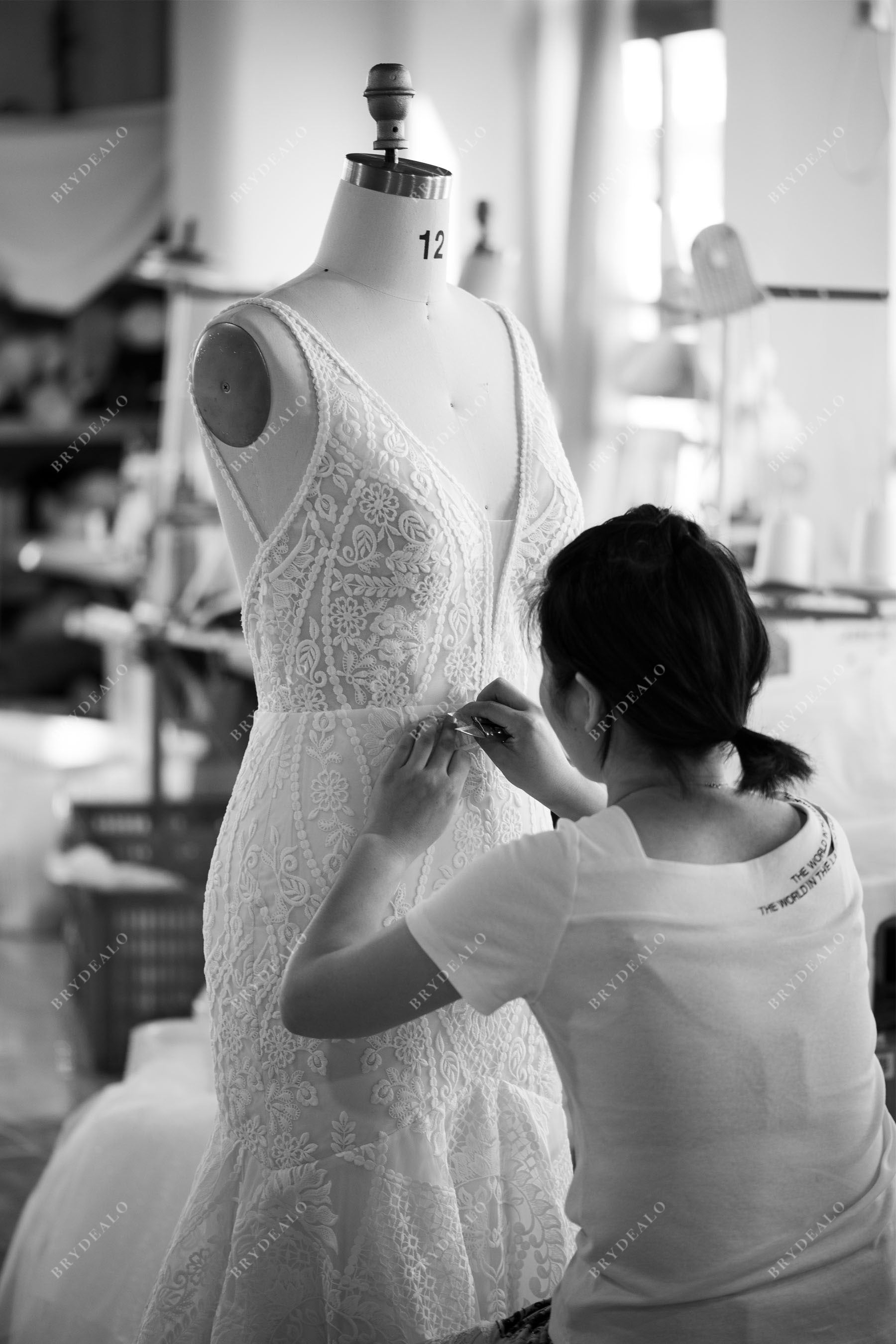 designer sleeveless boho lace wedding gown